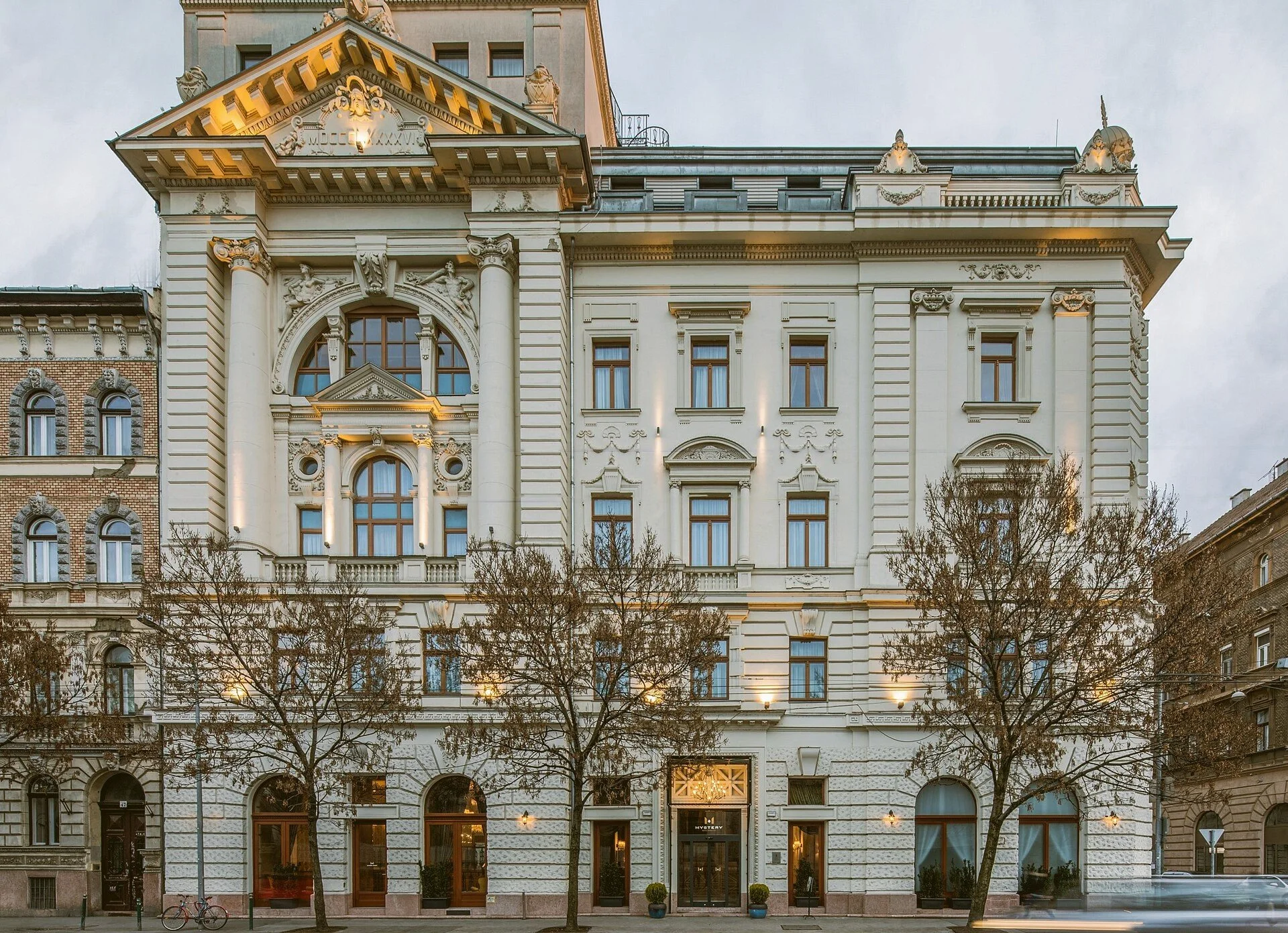 Mystery Hotel Budapest, a former Freemasons' palace with a cream neoclassical facade