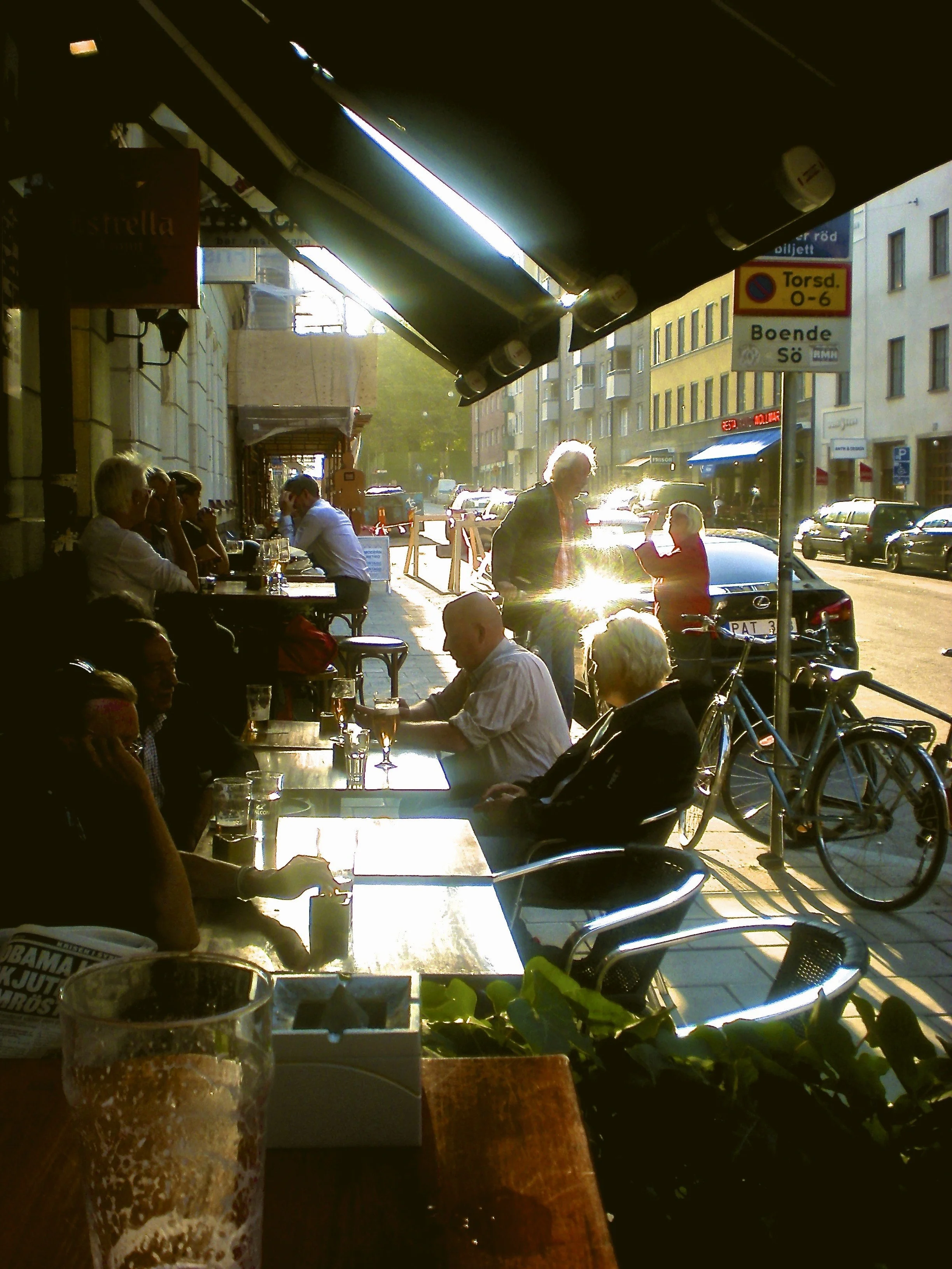 People sitting at outdoor tables in Södermalm, Stockholm