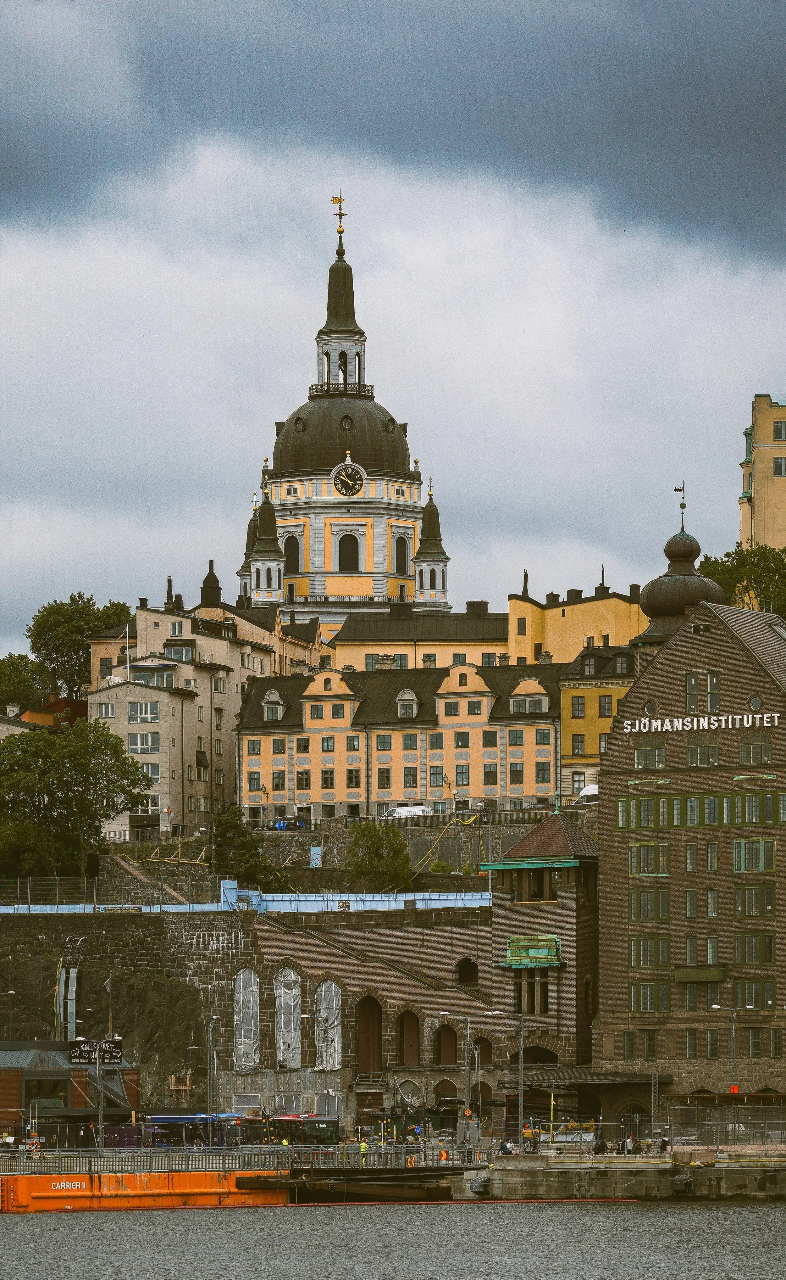 Dome and spire of Katarina Church seen from street level on a cloudy day, Stockholm