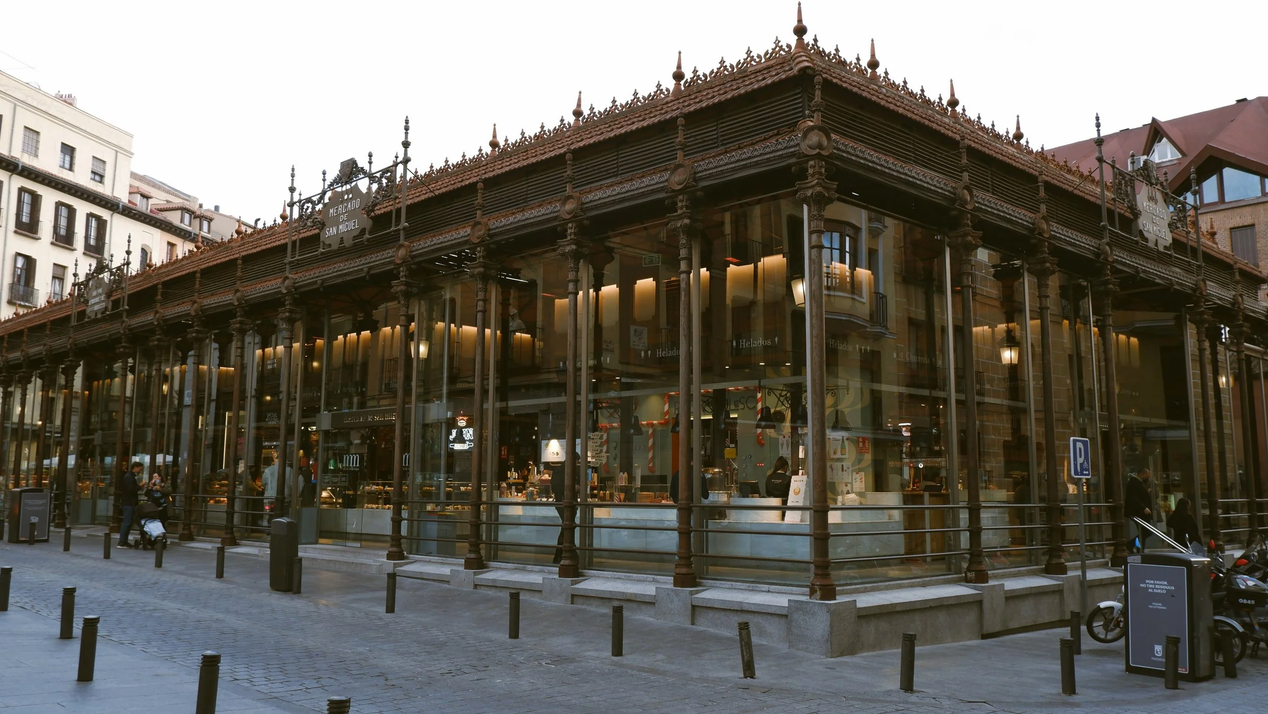 Exterior of the Mercado de San Miguel glowing at dusk, Madrid
