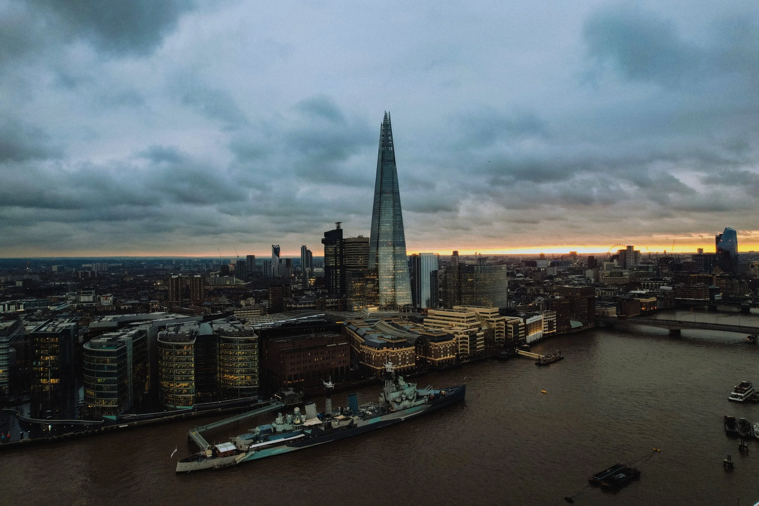 The Shard rising above the River Thames skyline at dusk, London