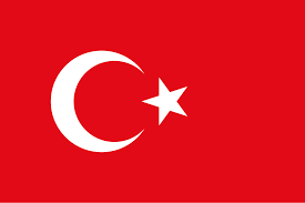 Flag of Turkey showing a red background with a white star and crescent.