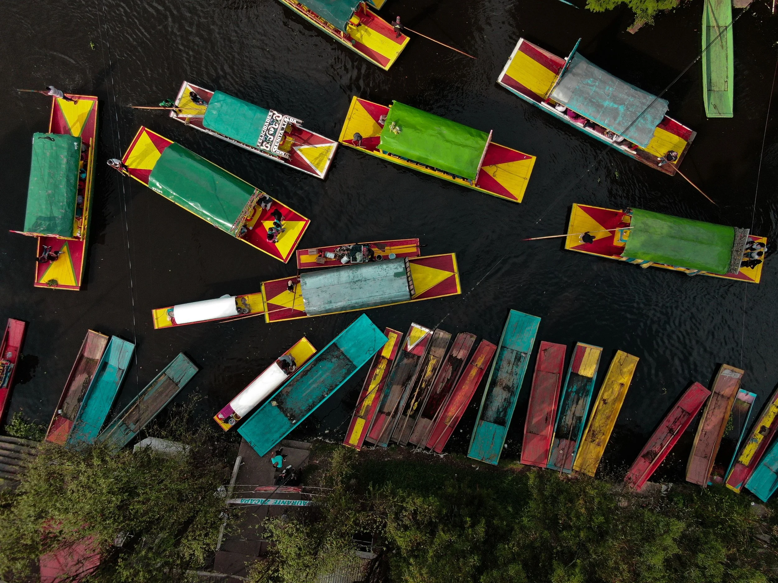 Aerial view of colorful trajineras on the canals, Xochimilco, Mexico City.