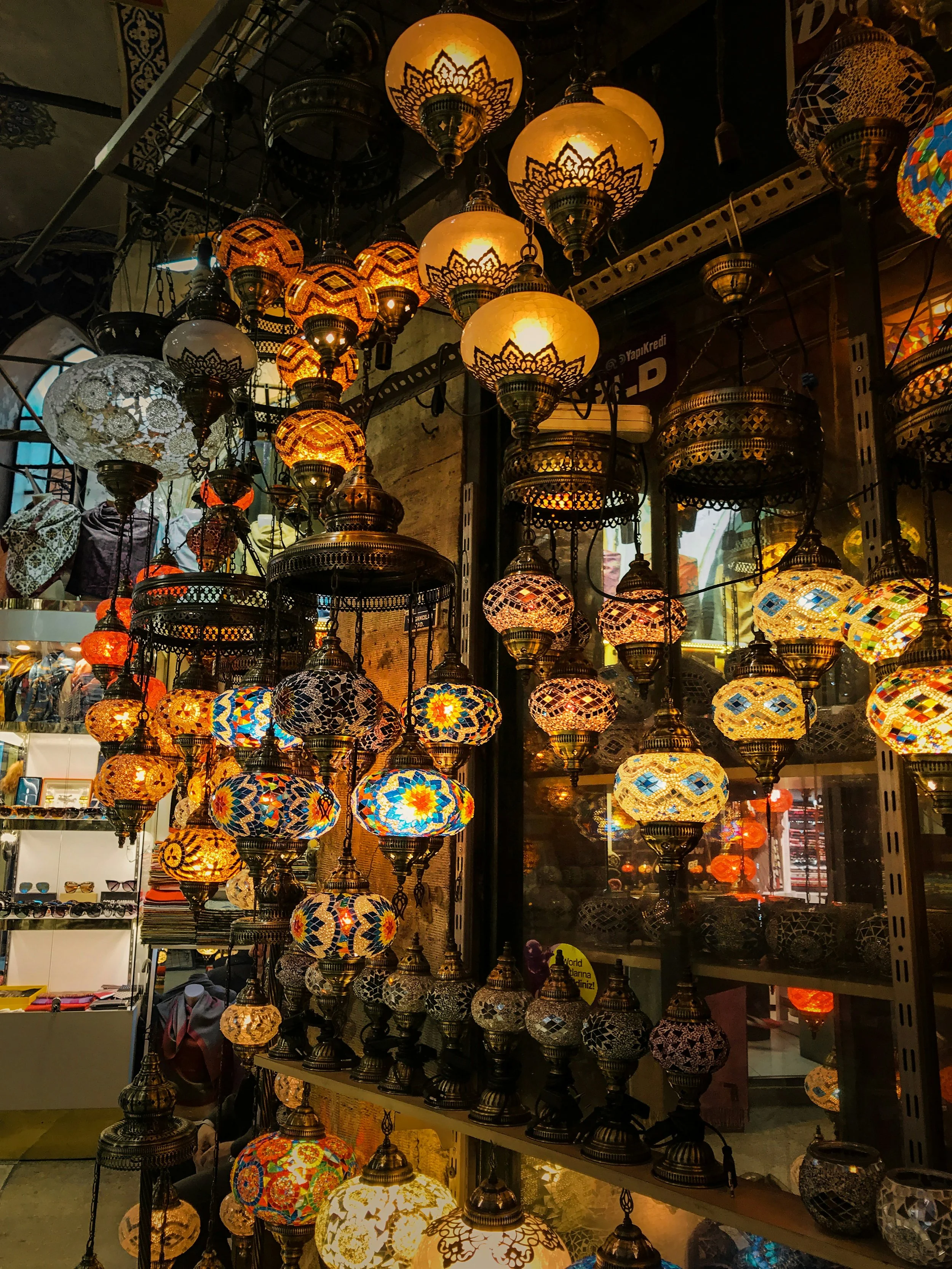 Turkish mosaic lanterns glowing in a shop at the Grand Bazaar, Istanbul.