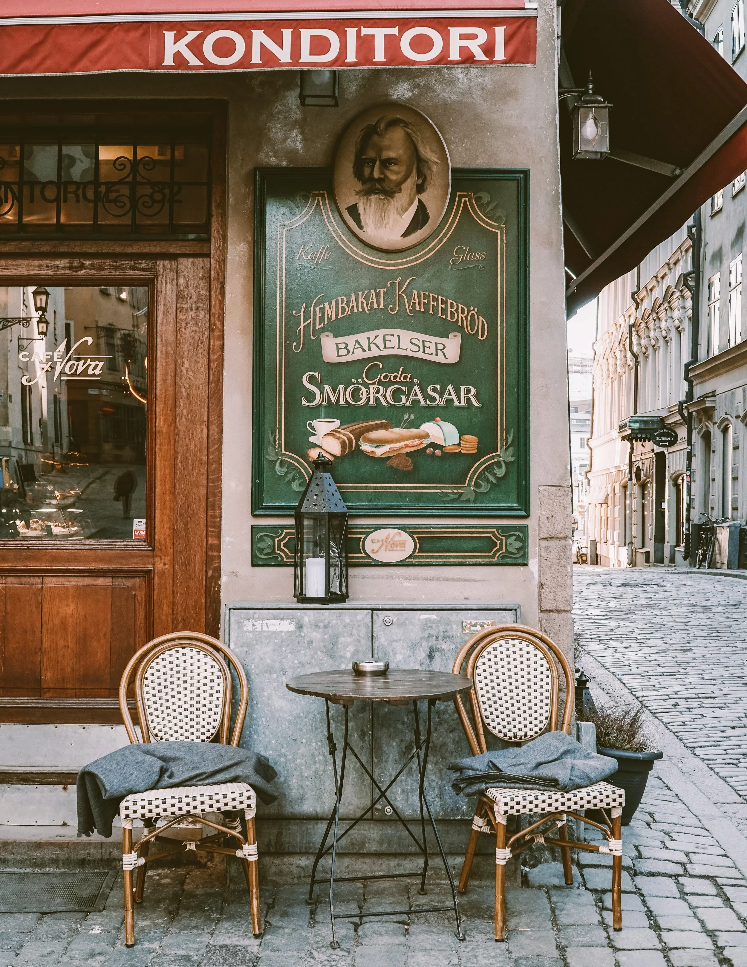 Outdoor table and chairs at a traditional konditori café in Stockholm, ideal for fika