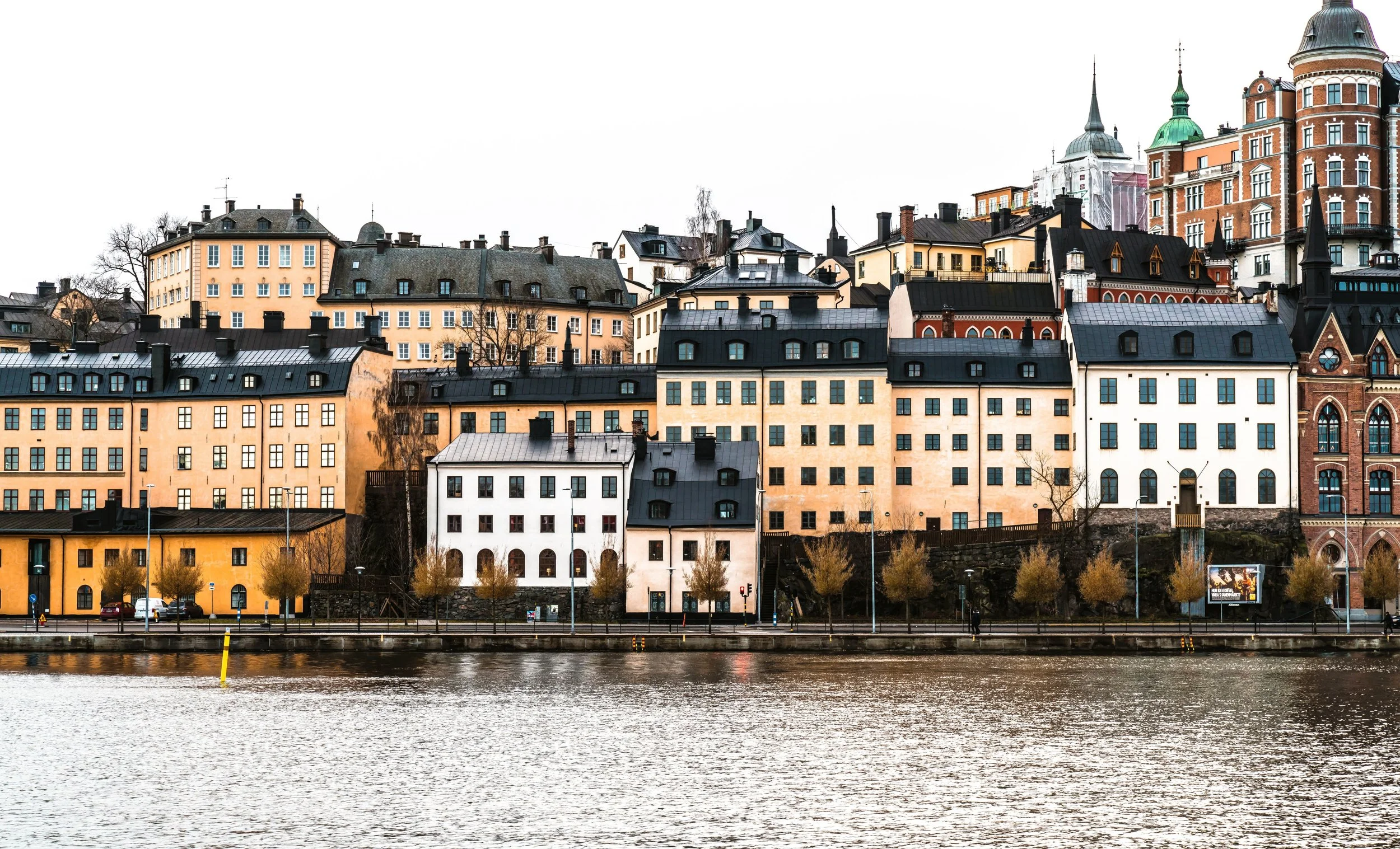 Colorful waterfront buildings of Södermalm across the water, Stockholm