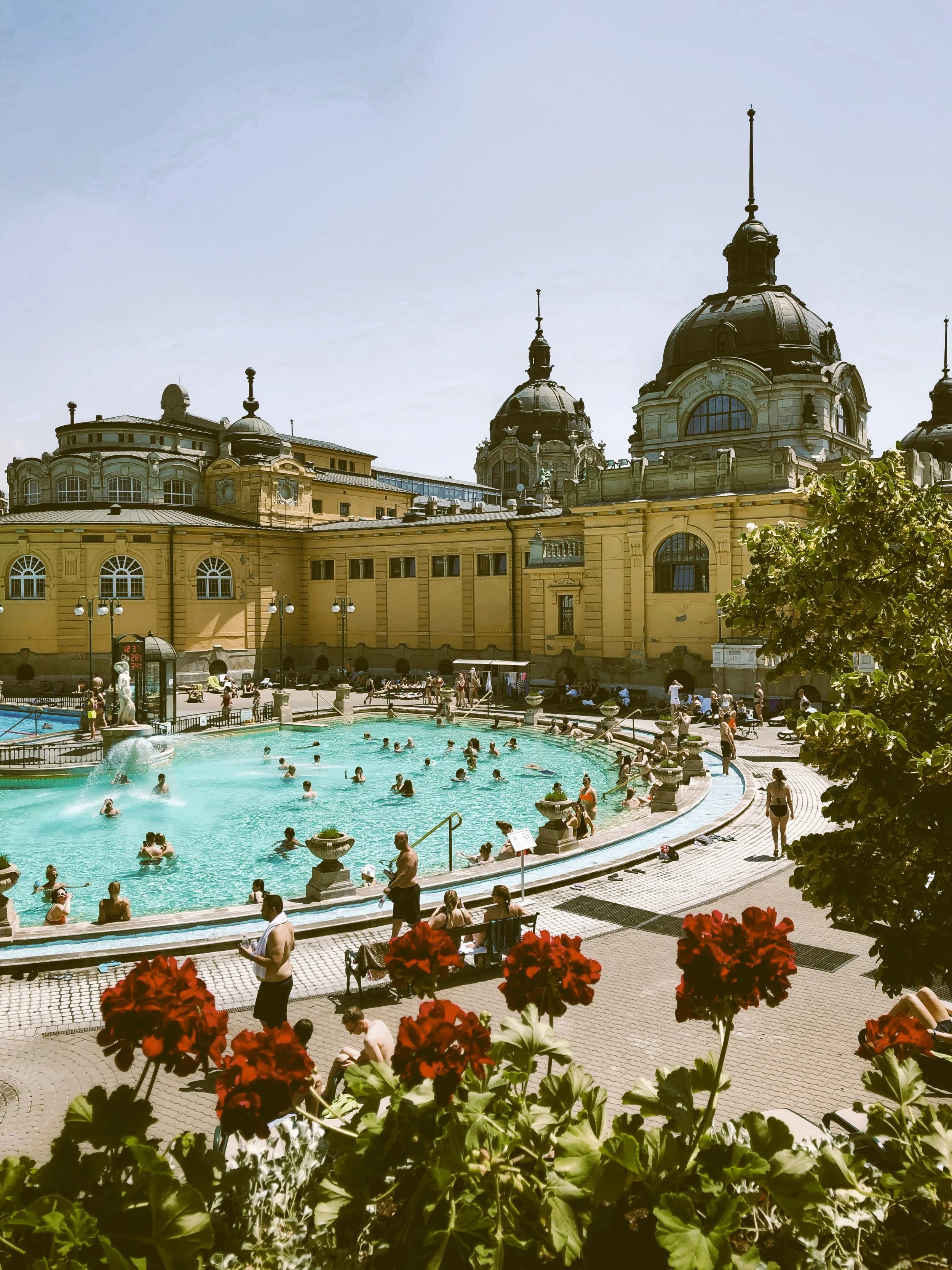 Outdoor pool at Széchenyi Thermal Bath with the yellow domed building, Budapest