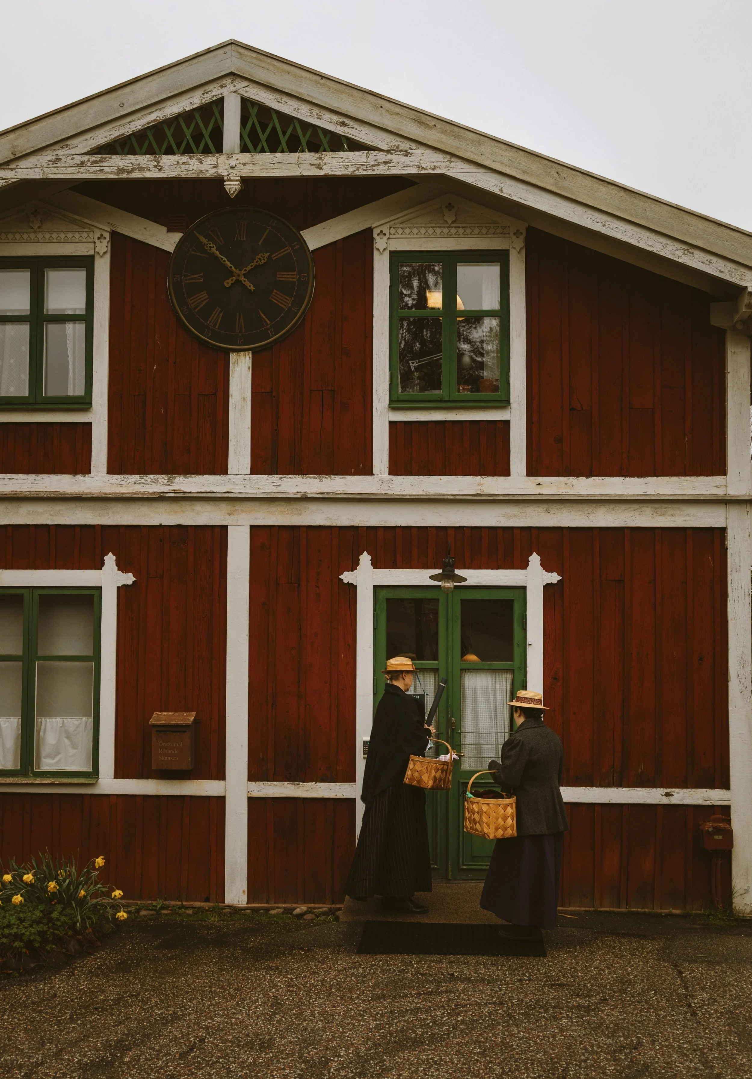 Traditional red wooden house with white trim at Skansen, Djurgården island, Stockholm