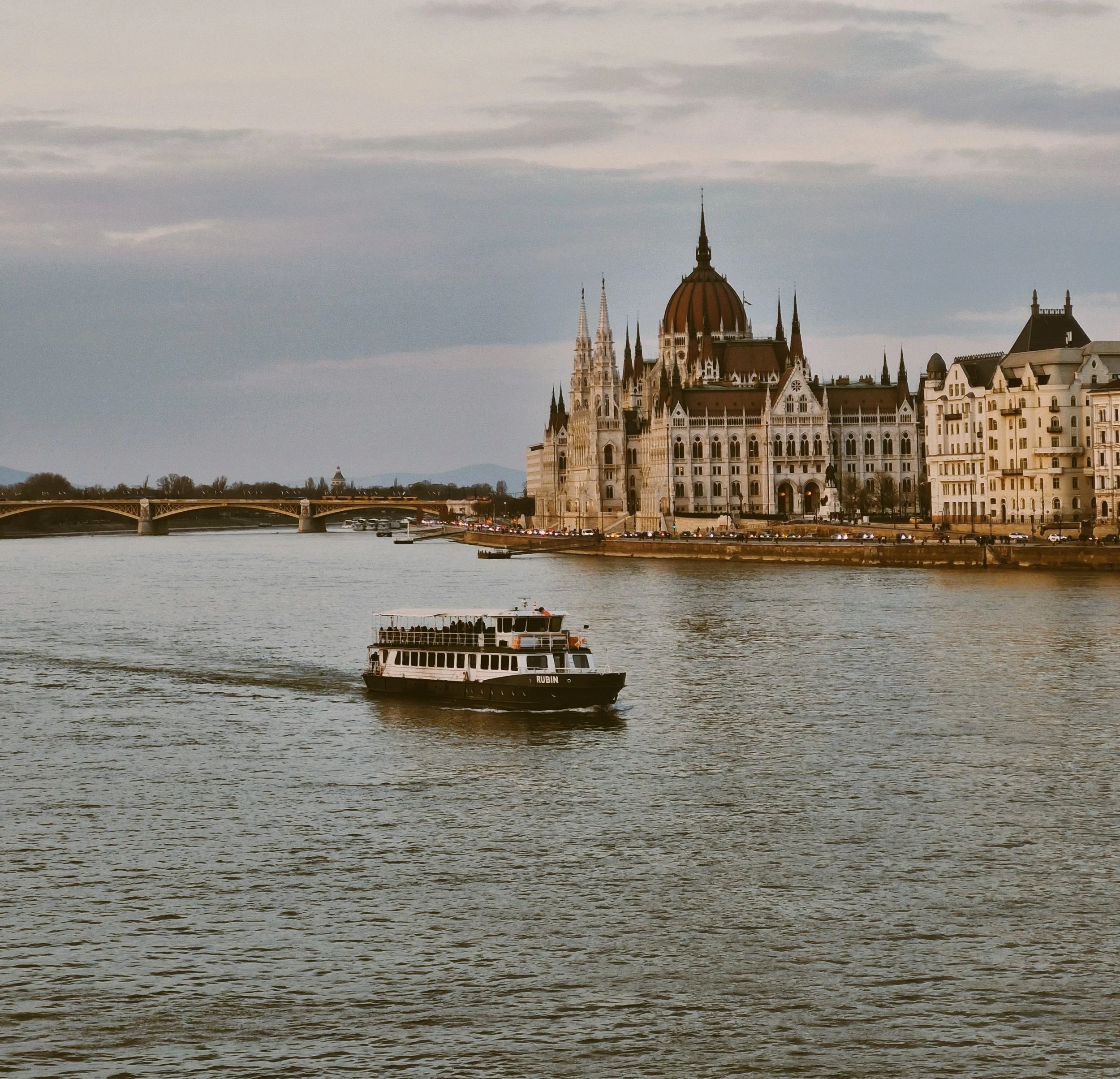 Boat on the Danube in front of the Hungarian Parliament Building, Budapest