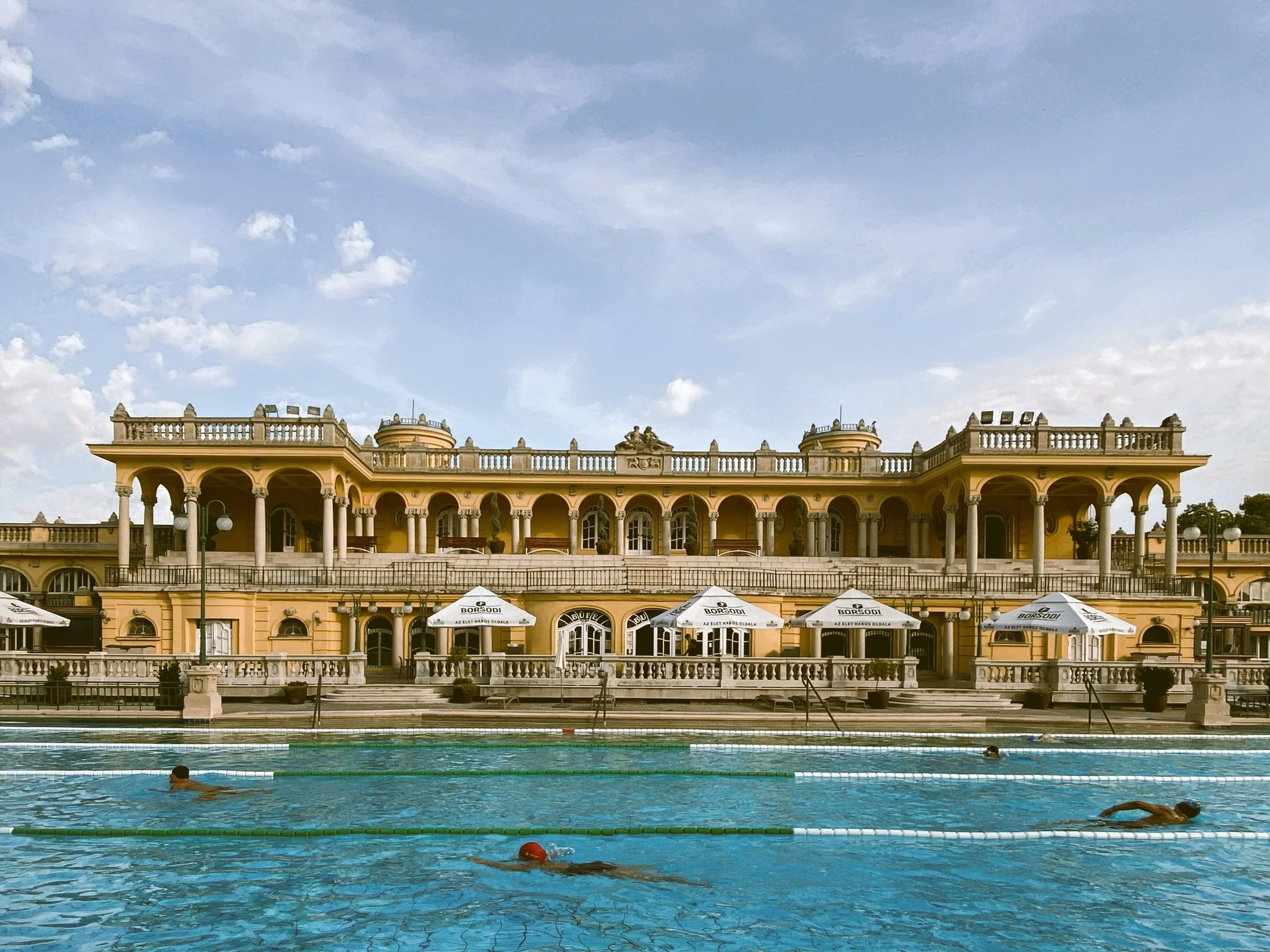 Swimmers below the columned terrace of Széchenyi Thermal Bath, Budapest