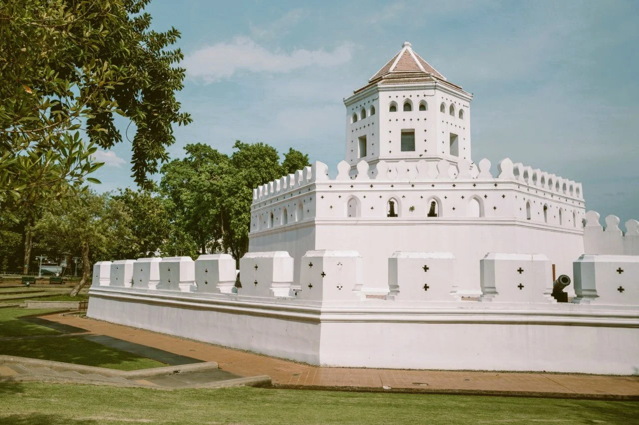 Phra Sumen Fort, a white octagonal fortress with a small tower, beside trees, Banglamphu, Bangkok.