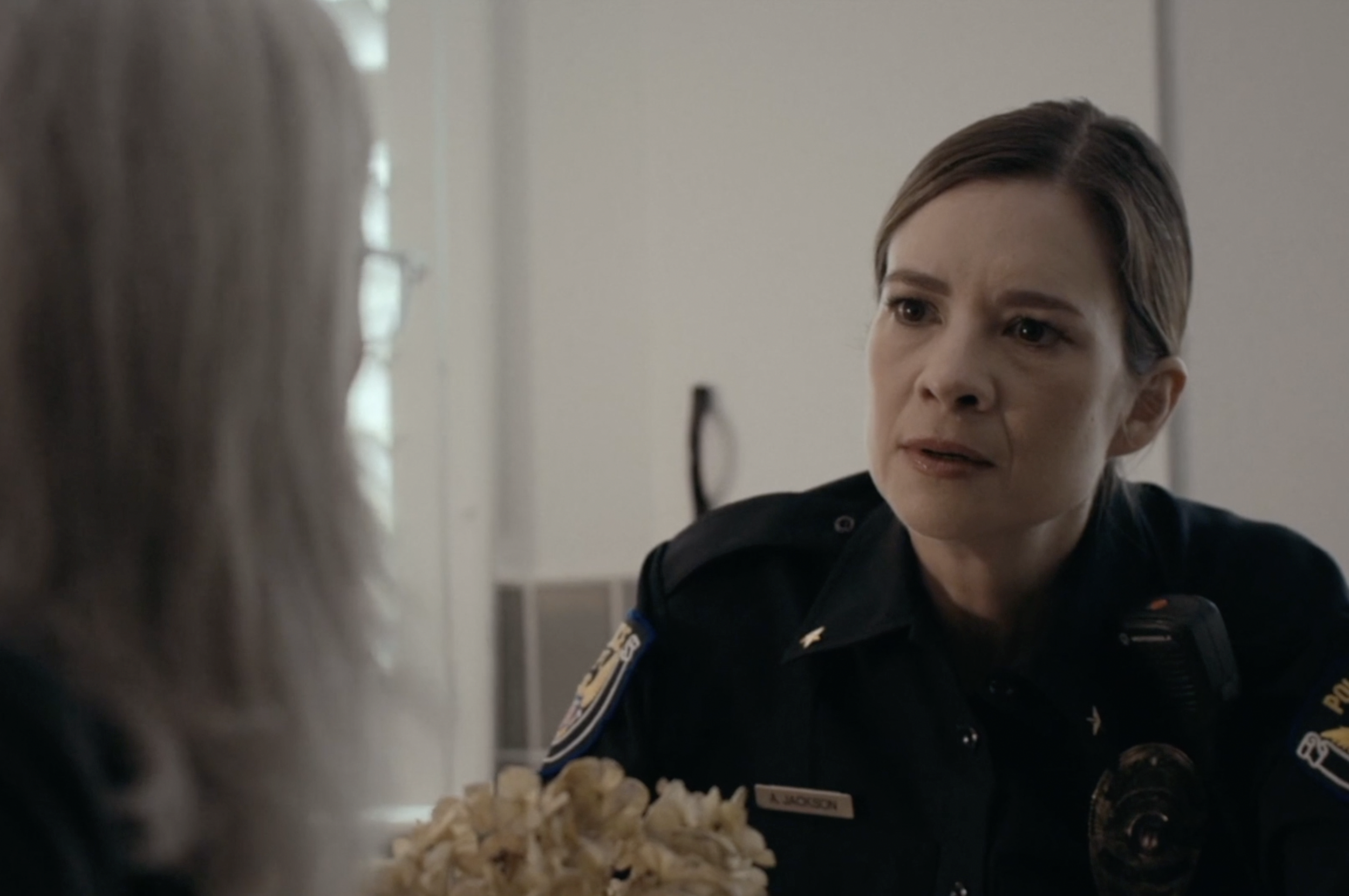 Kathleen Lancaster cop uniform