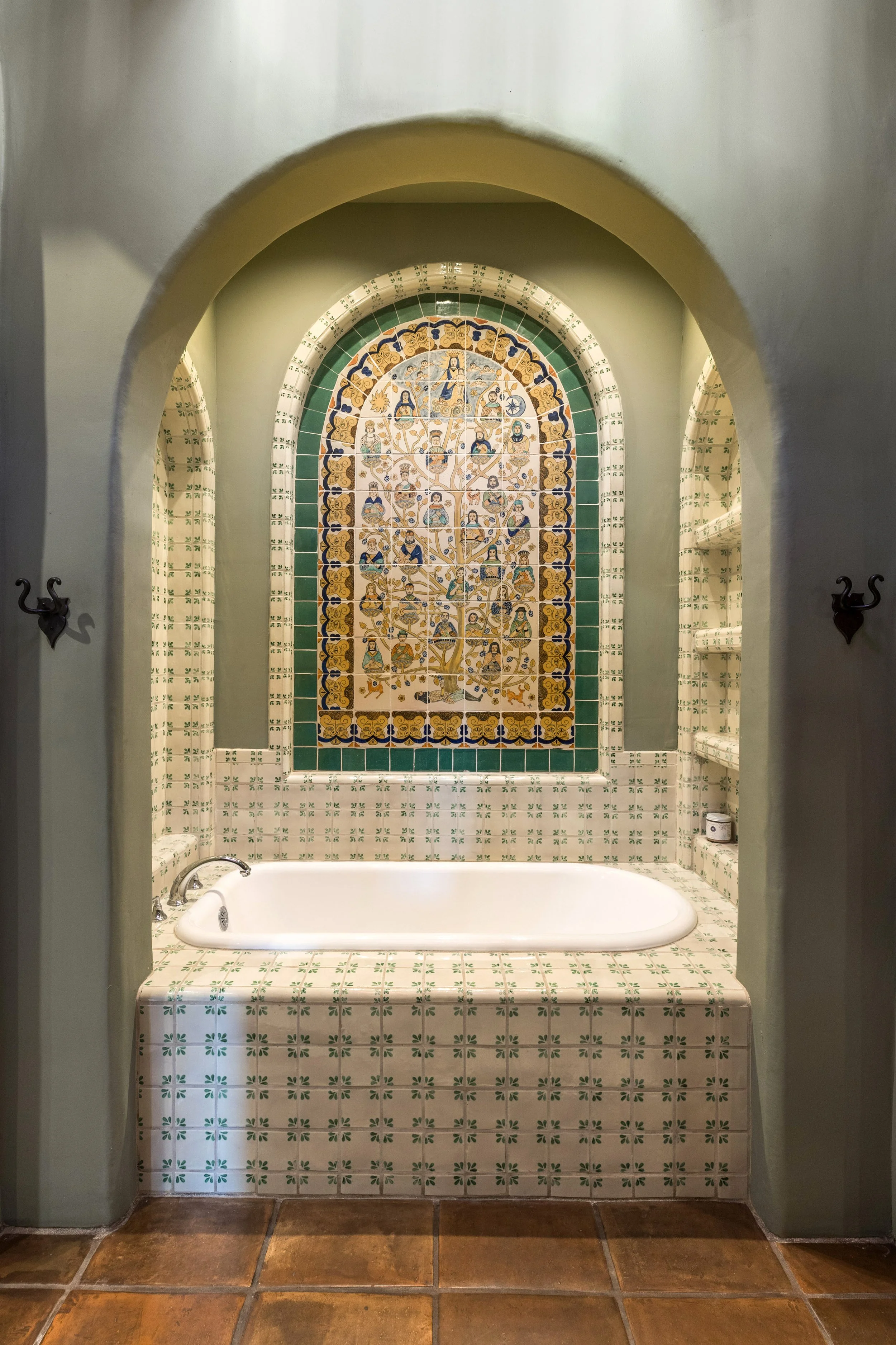 Hand-painted Talavera tile bathroom with built-in soaking tub at SENDERO luxury Taos New Mexico estate