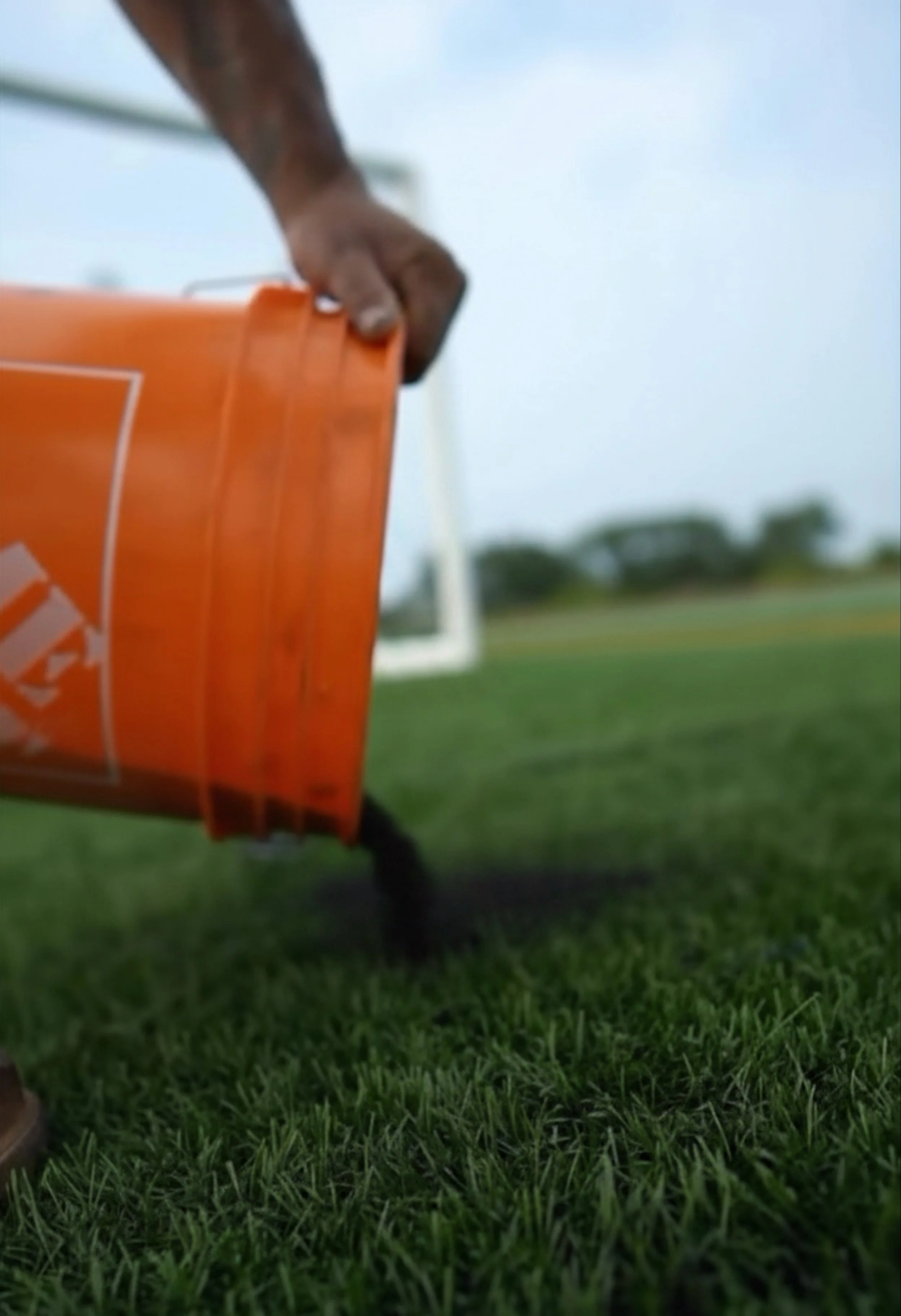 Artificial turf football field construction in Ontario
