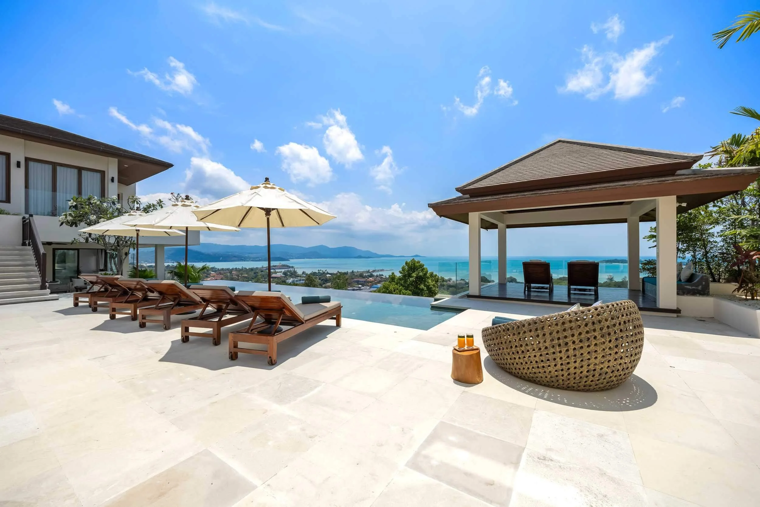 Outdoor sun deck and infinity pool terrace overlooking the sea, accessible directly from the Sanctuary Suite at Saensook villa near Choeng Mon Beach