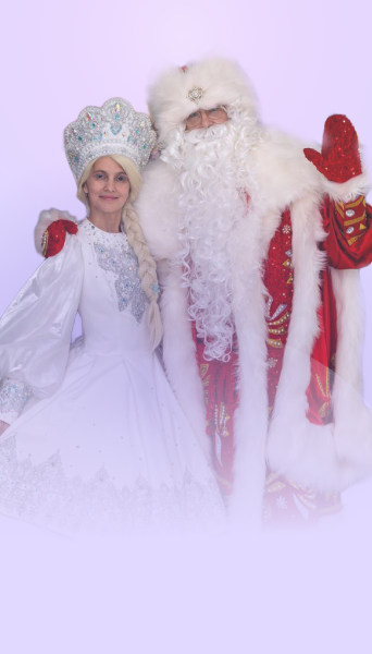 A young girl dressed as a princess or snow queen standing next to Santa Claus, who is in a red and white suit with a long white beard, against a soft purple background.