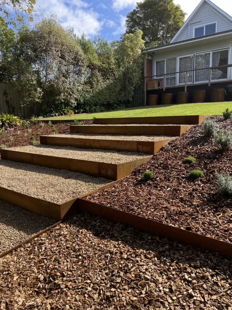 custom-corten-steppers-to-outdoor-entertaining-area-lush-sir-Walter-lawns-768x1024.jpg.webp