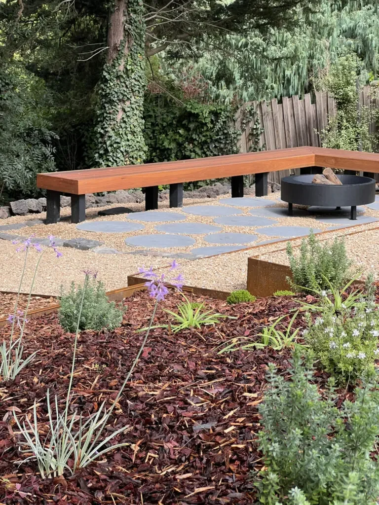 custom-bench-seating-bluestone-steppers-in-fire-pit-area-768x1024.jpg.webp