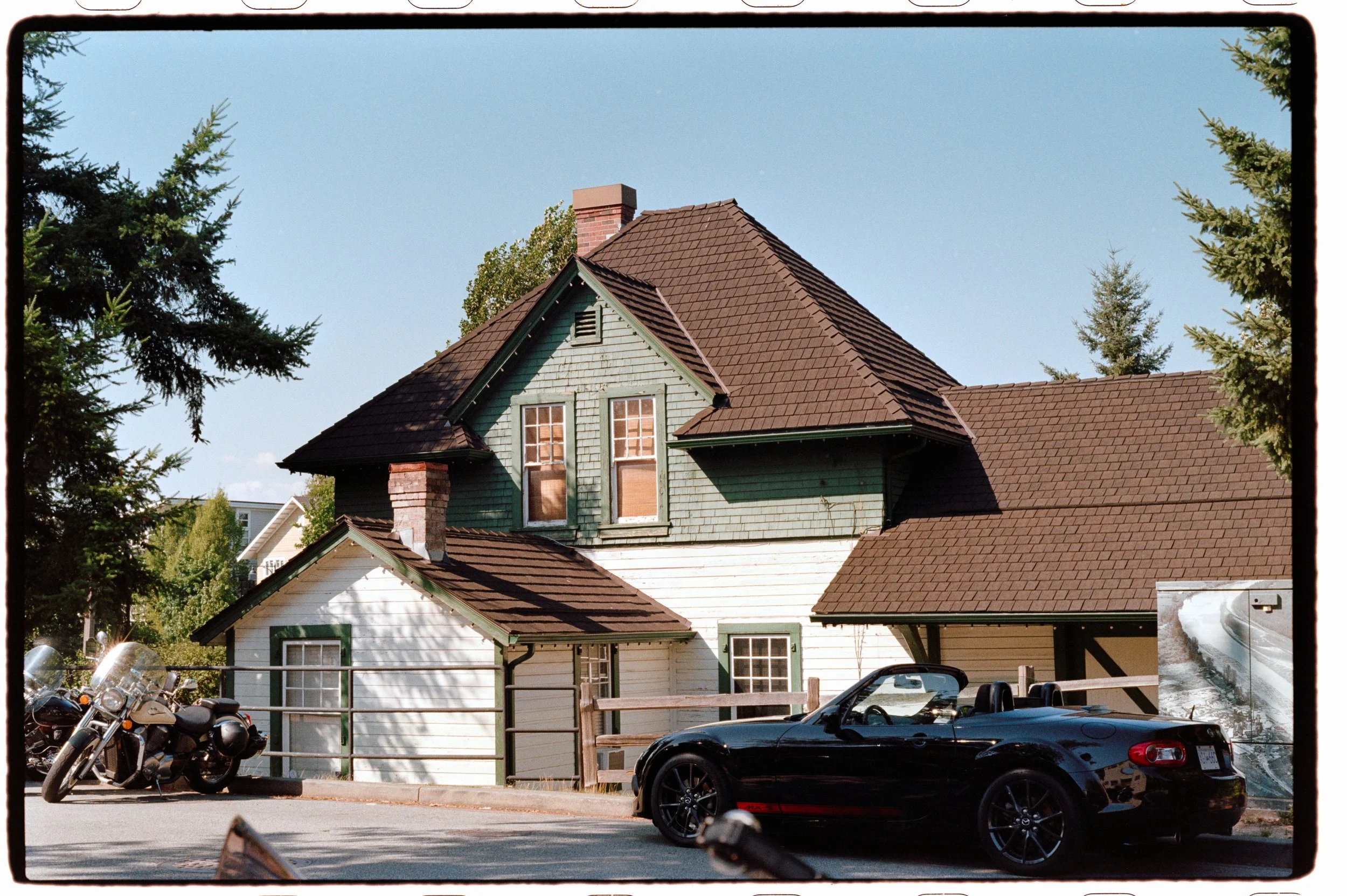 A vintage coupe parked in front of the house in Fort Langley, captured by Nikon F90X with AF 50mm f1.8, Kodak Kodacolor 200
