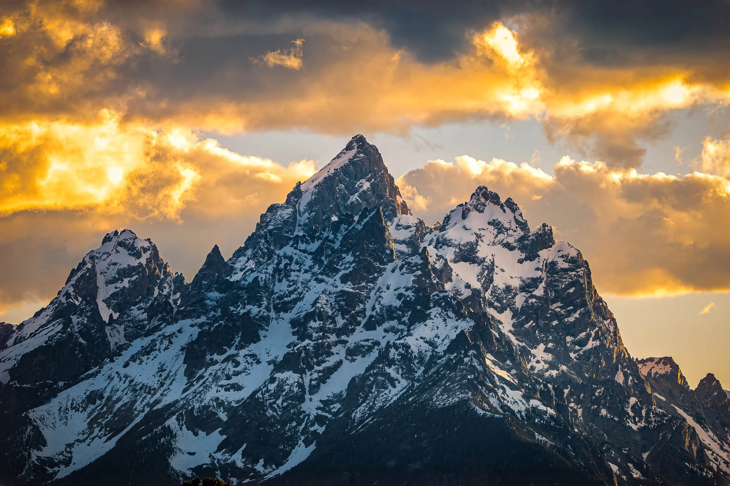  Ignited Peaks 
This photograph holds a special place in the collection as it was the only sunset shot I managed to capture during the entire trip. What I love most about this image is how the fading light gently kisses the rugged granite peaks, igni