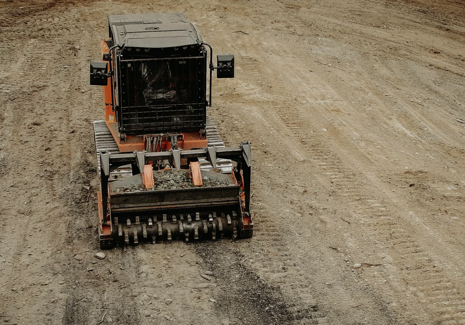 Logan Earthworks completing forestry mulching to reclaim overgrown land and improve property accessibility in Niles, Ohio.