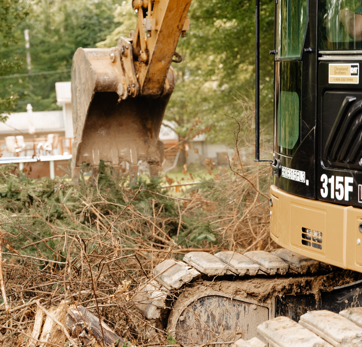 Professional land clearing, excavation, forestry mulching, grading, driveway installation, drainage solutions, and site preparation by Logan Earthworks in Niles, OH.