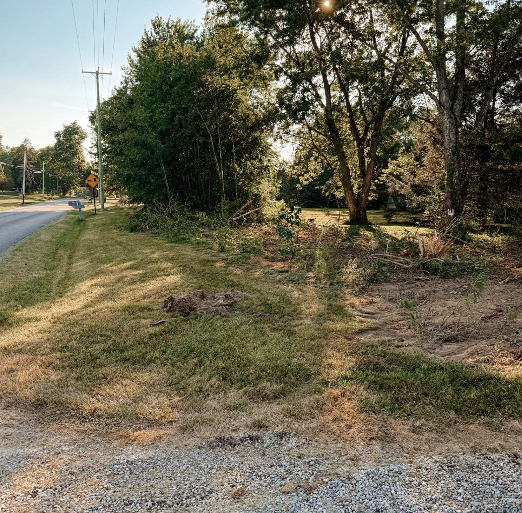 Gravel driveway installation with professional grading and base preparation near Massillon, Ohio.