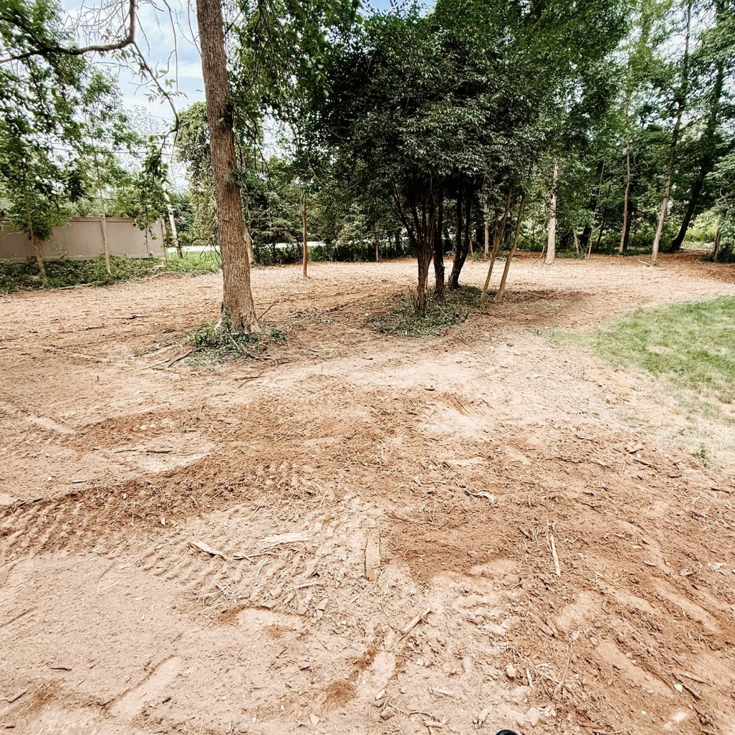 Gravel driveway grading and repair restoring a worn access road near Washington, Pennsylvania.