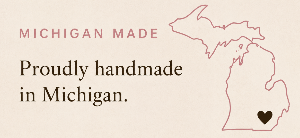 Design with the outline of Michigan with a heart in the lower part, the text "MICHIGAN MADE" at the top, and "Proudly handmade in Michigan" in the center.