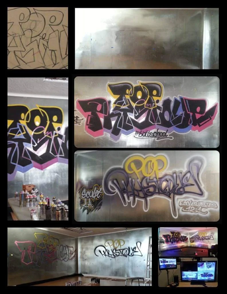 Various graffiti and spray paint art on the walls of an indoor space, including tags, characters, and colorful designs, some with hashtags and stylized lettering.