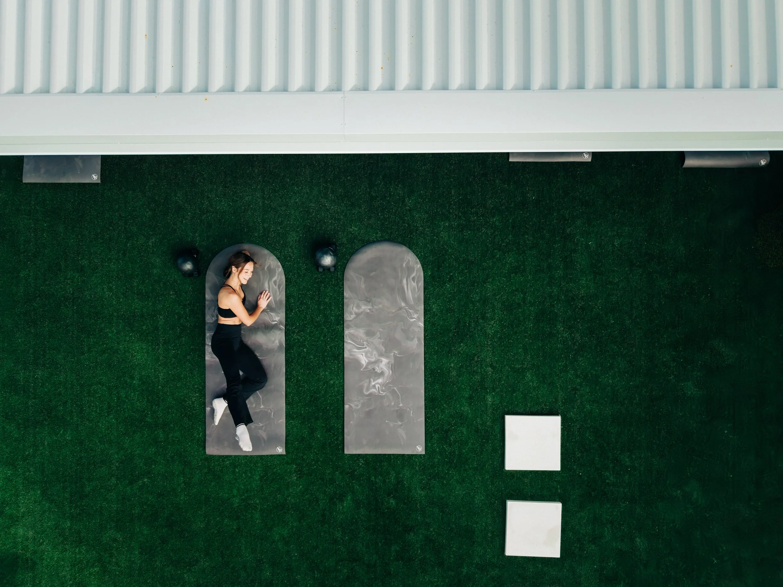 Aerial view of outdoor mat pilates studio on Sydney's Northern Beaches.