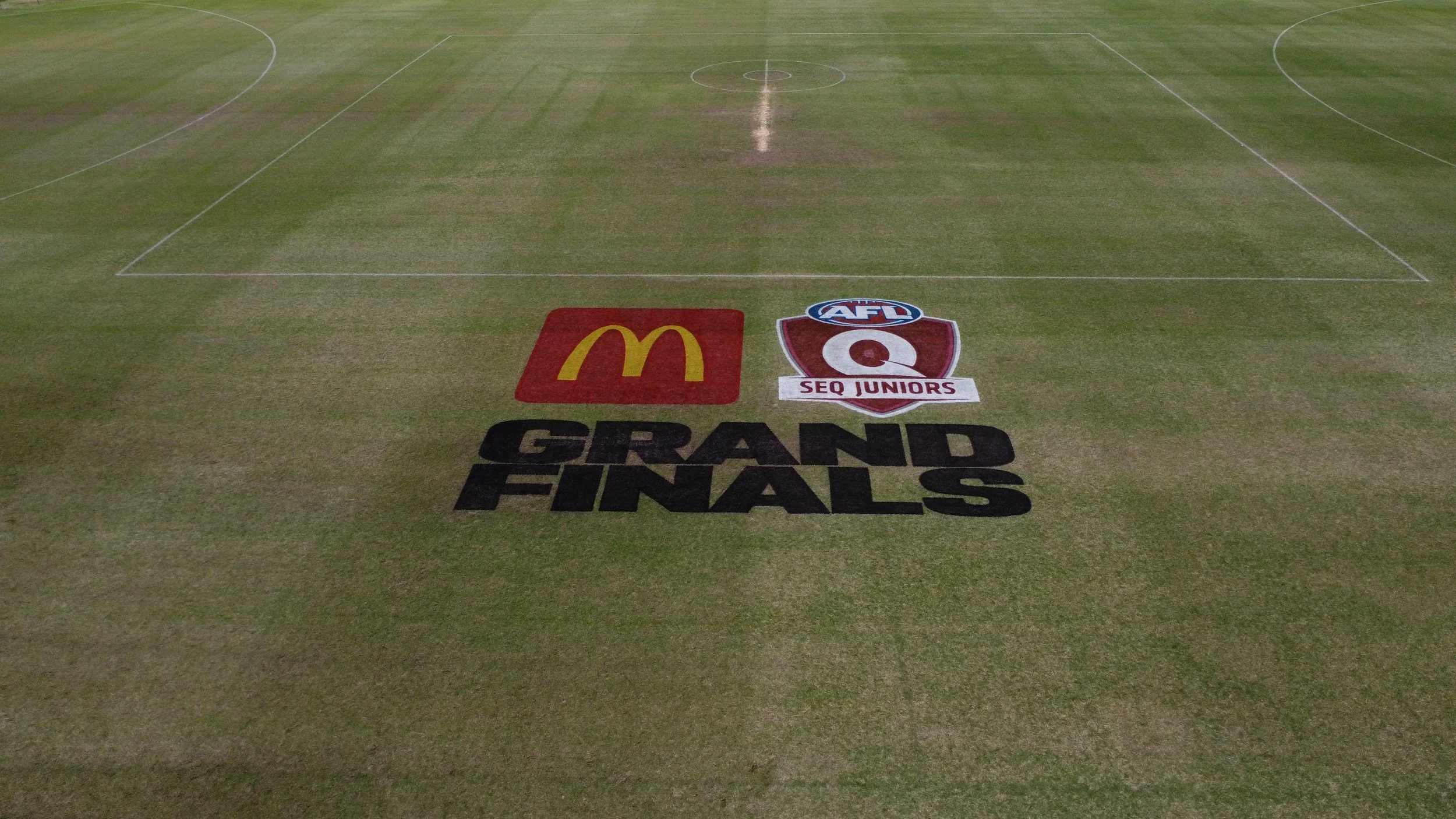 afl juniors grand final grass logo