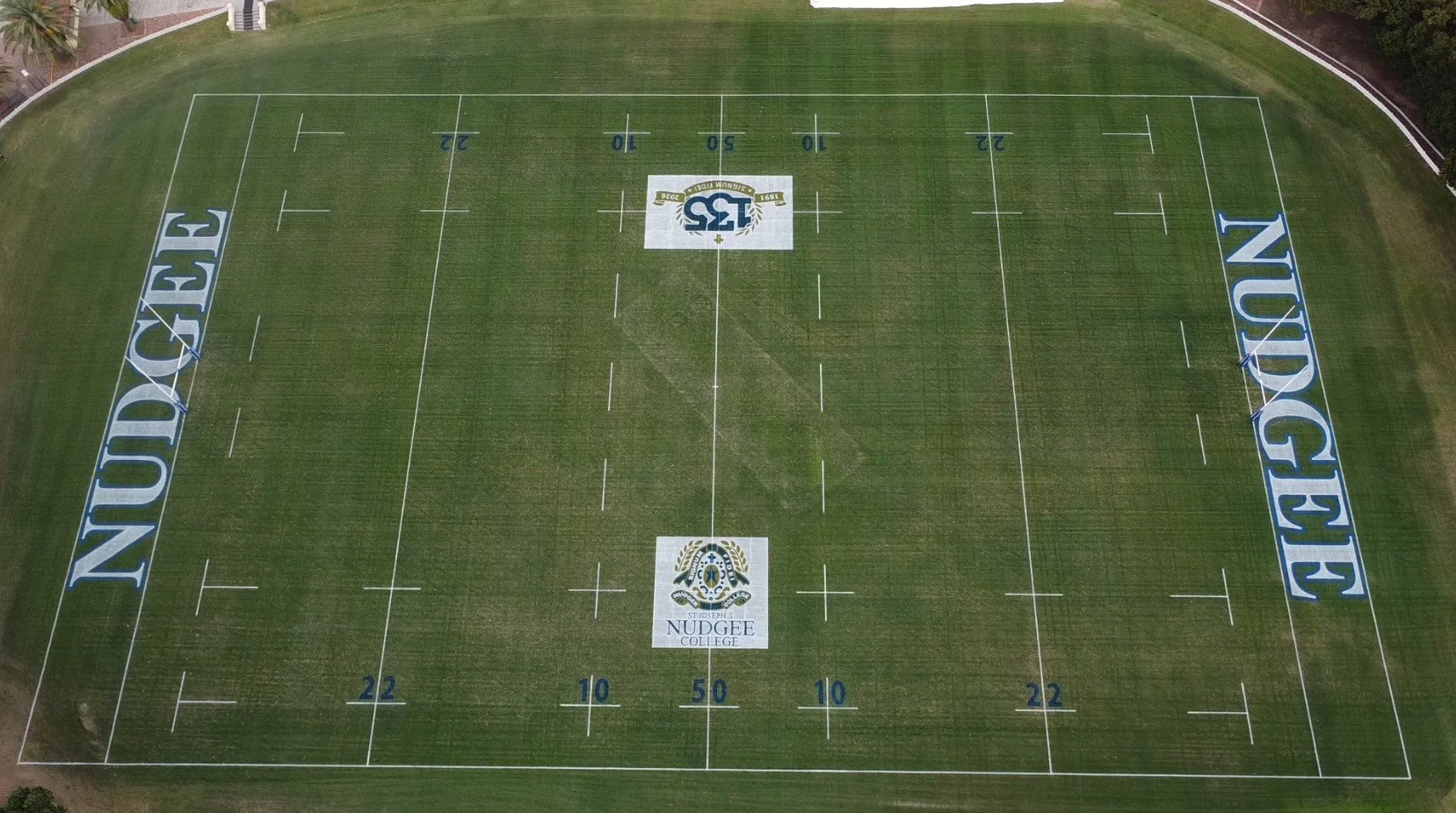brisbane painted grass logo