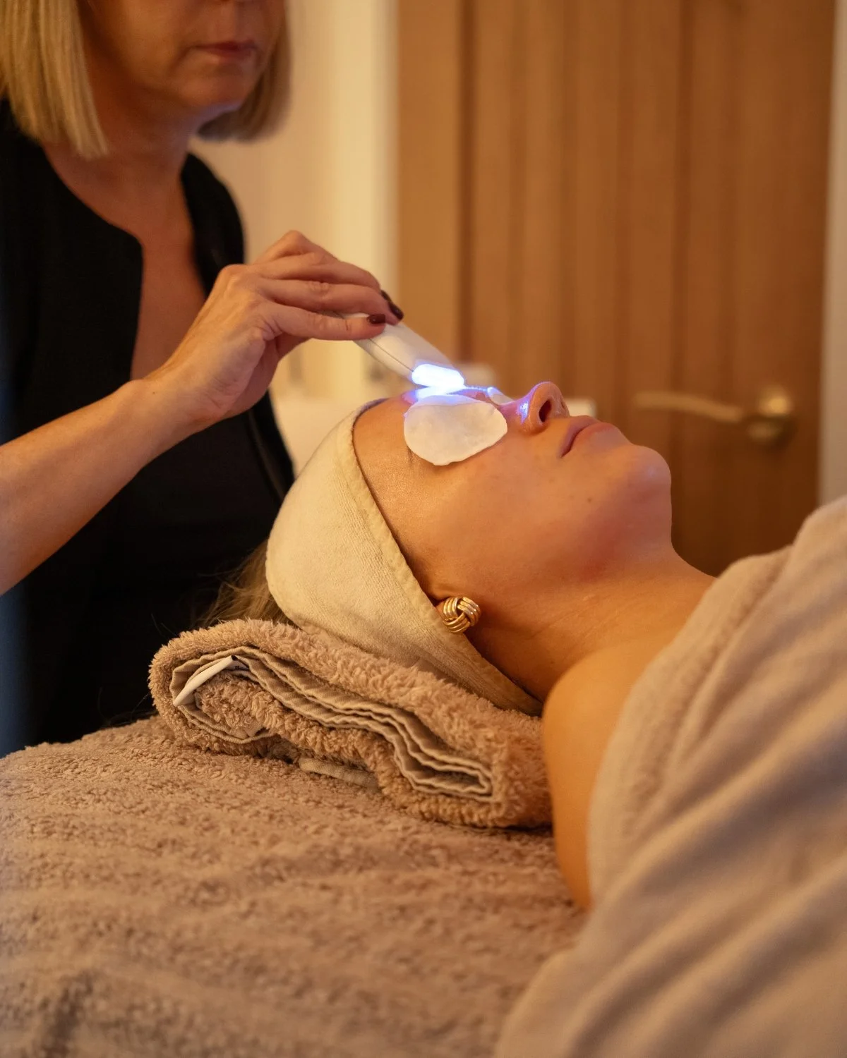 Advanced facial treatment using professional skincare technology at TG Skin & Wellness
