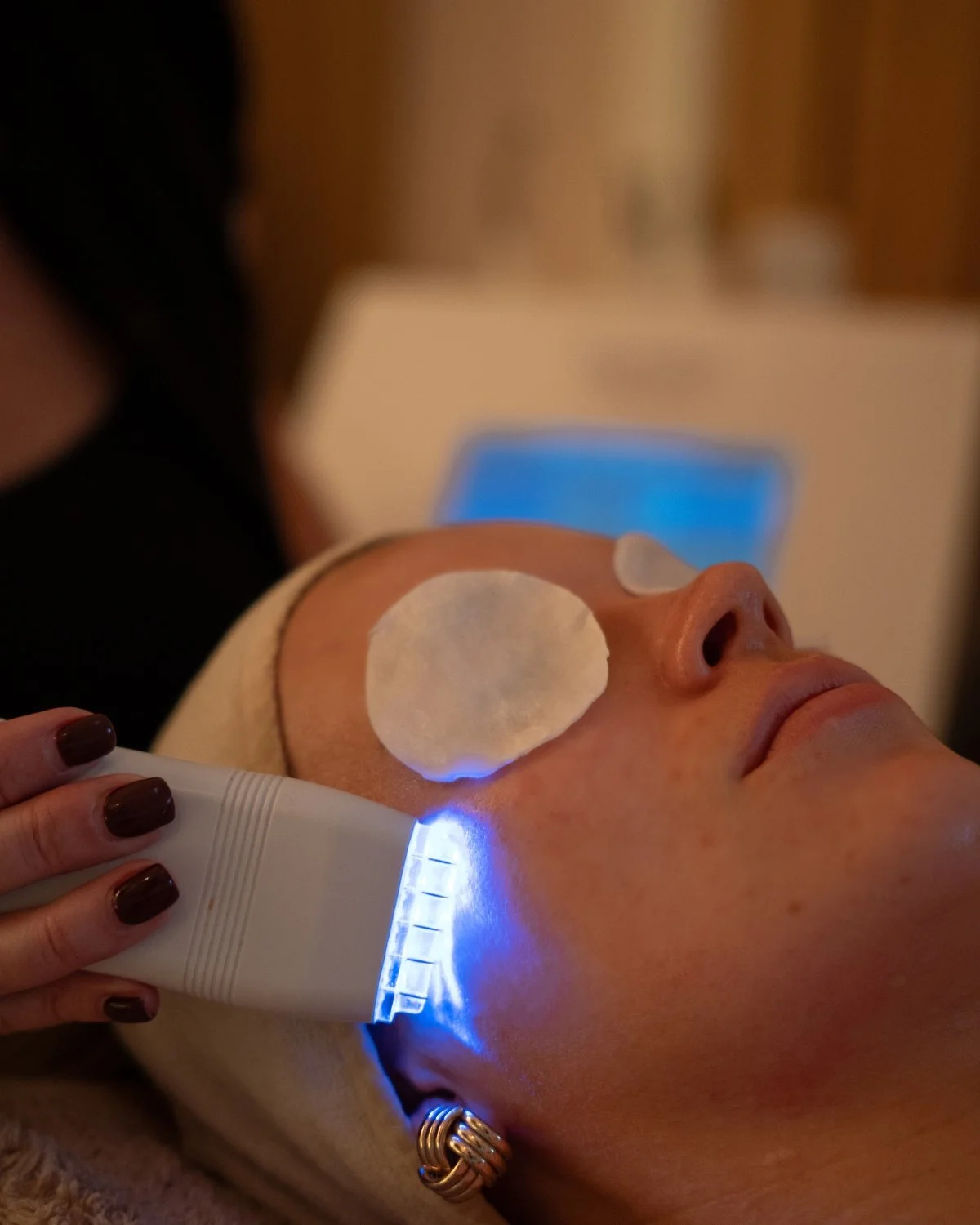 Advanced facial treatment using professional skincare technology at TG Skin & Wellness