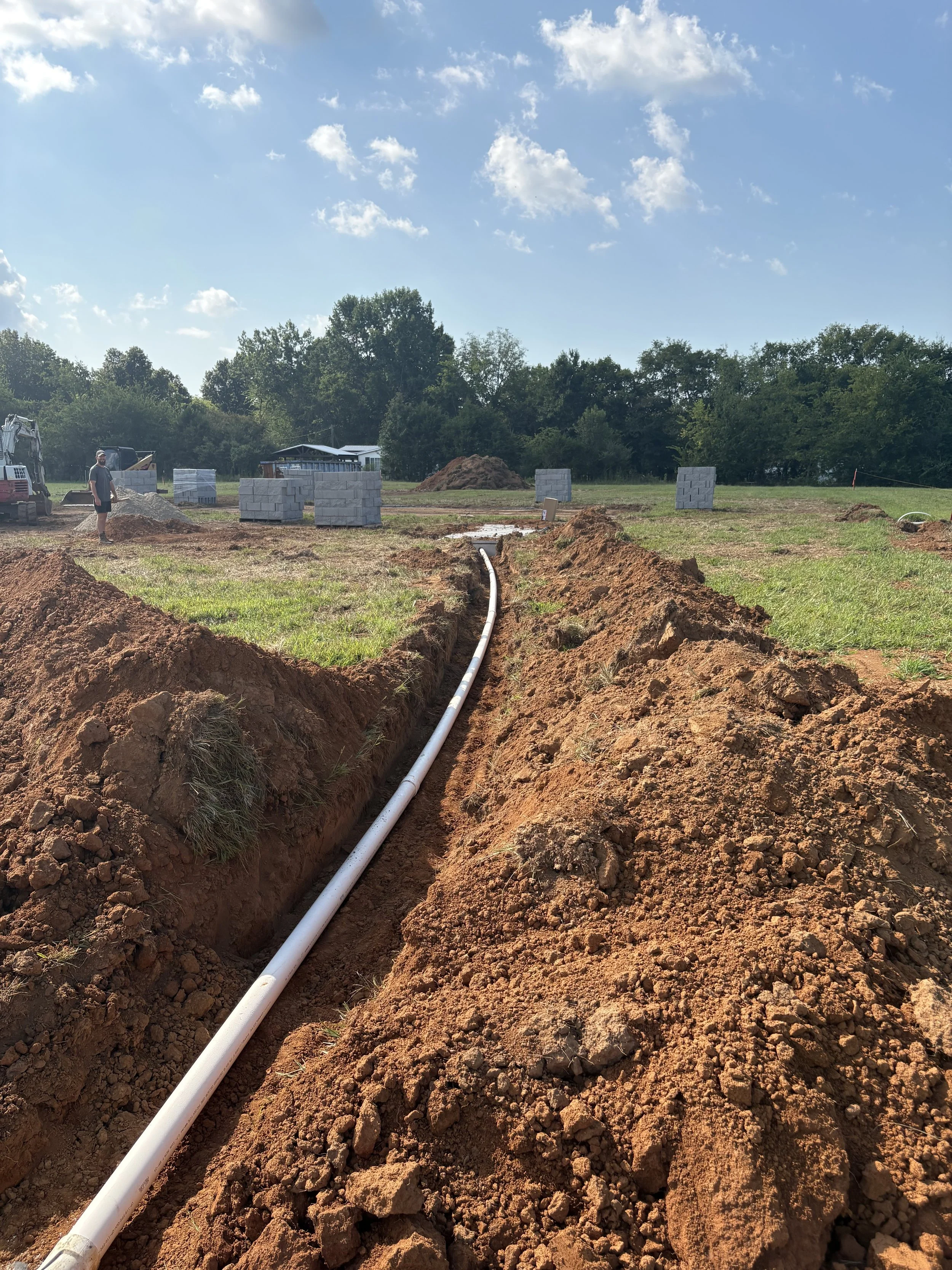 Septic Tank and a tight line to the leech field. 
This was installed in Lewisburg,TN