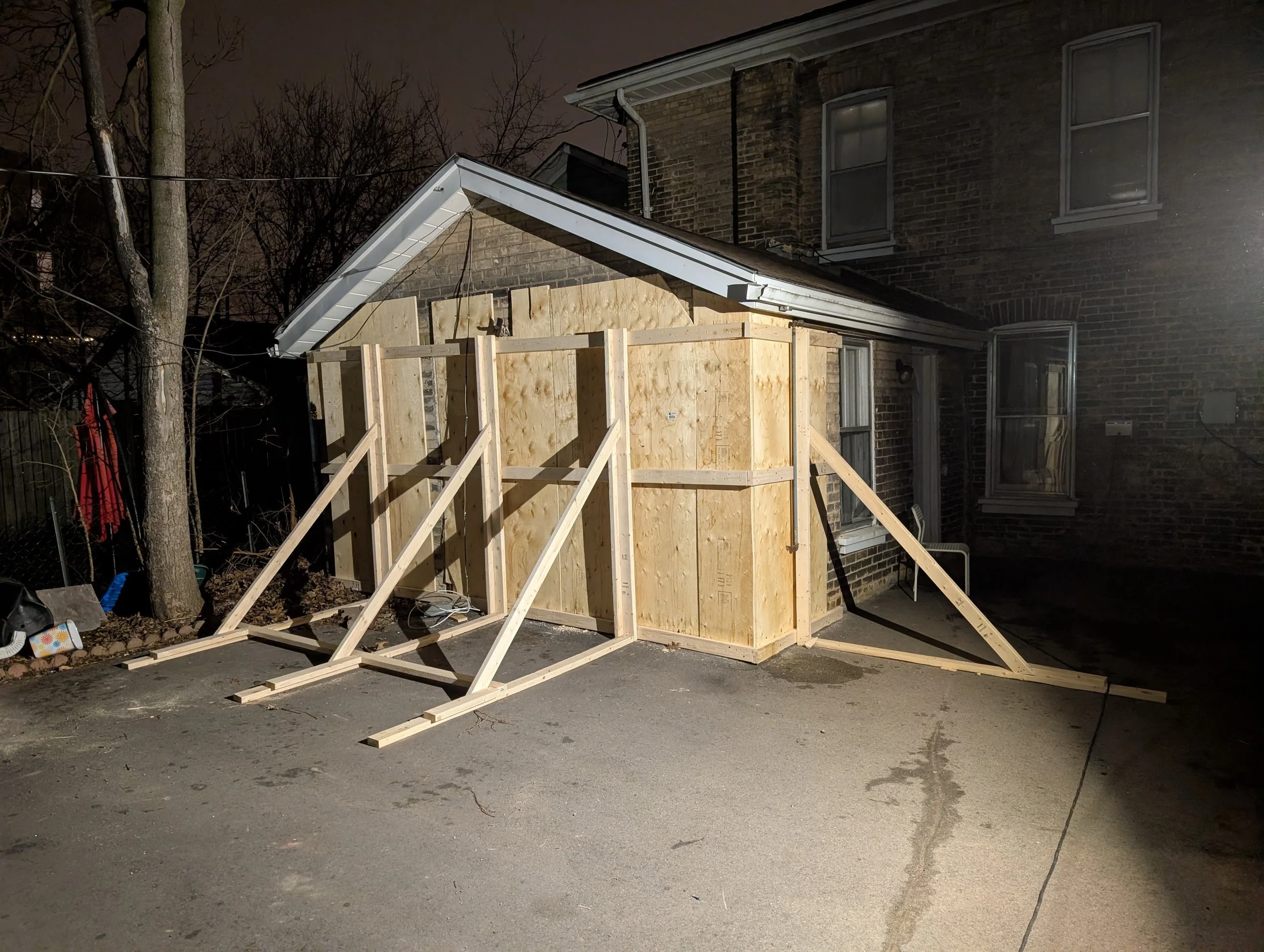 EMERGENCY SHORING: Vehicle into a house