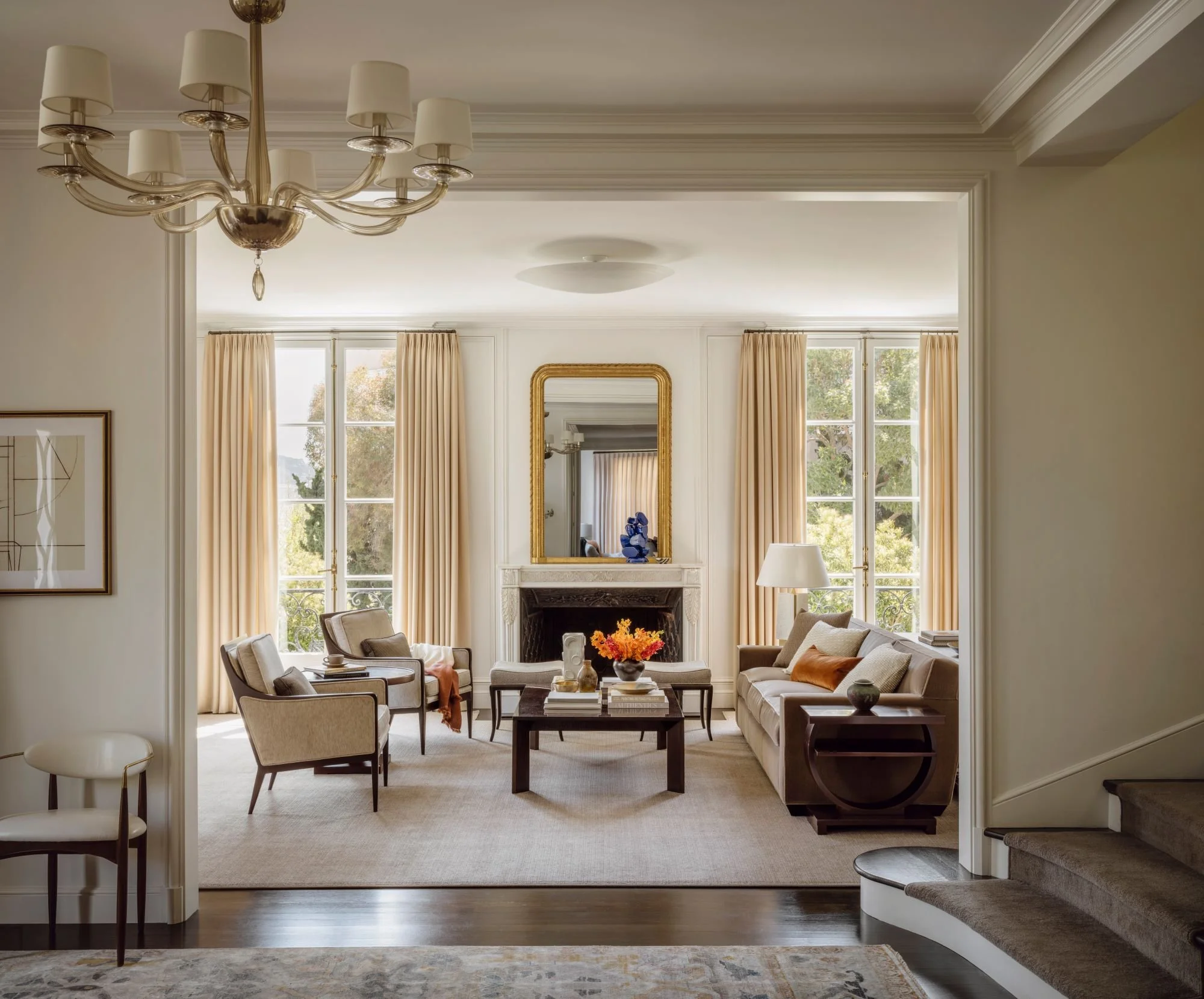 Formal interior with symmetrical architectural detailing and natural light.