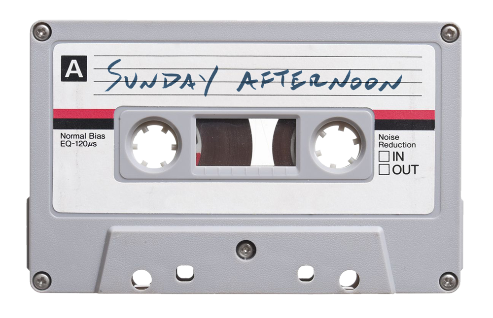 A cassette tape with a handwritten label that reads "Sunday Afternoon"