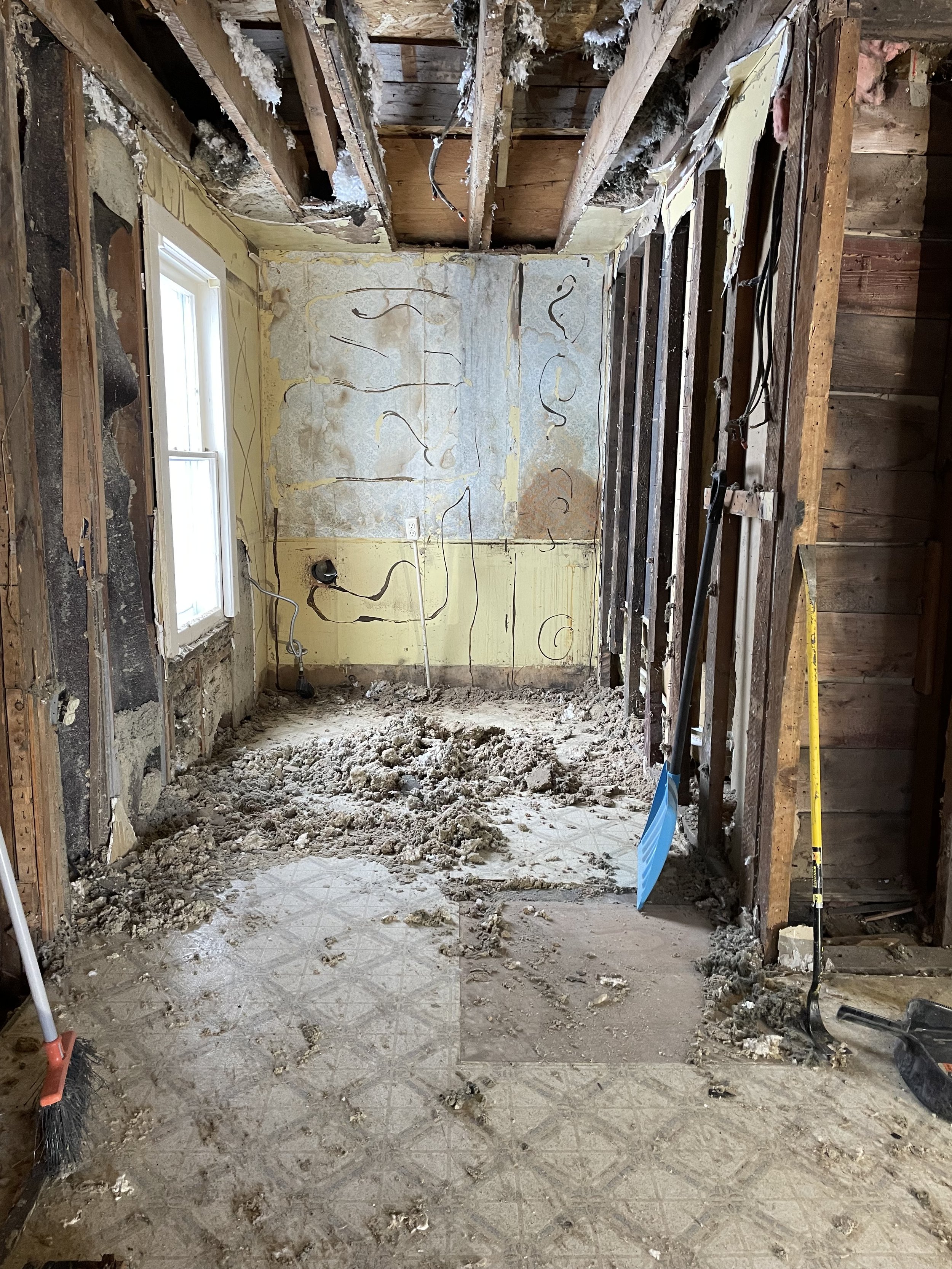 Laundry room before