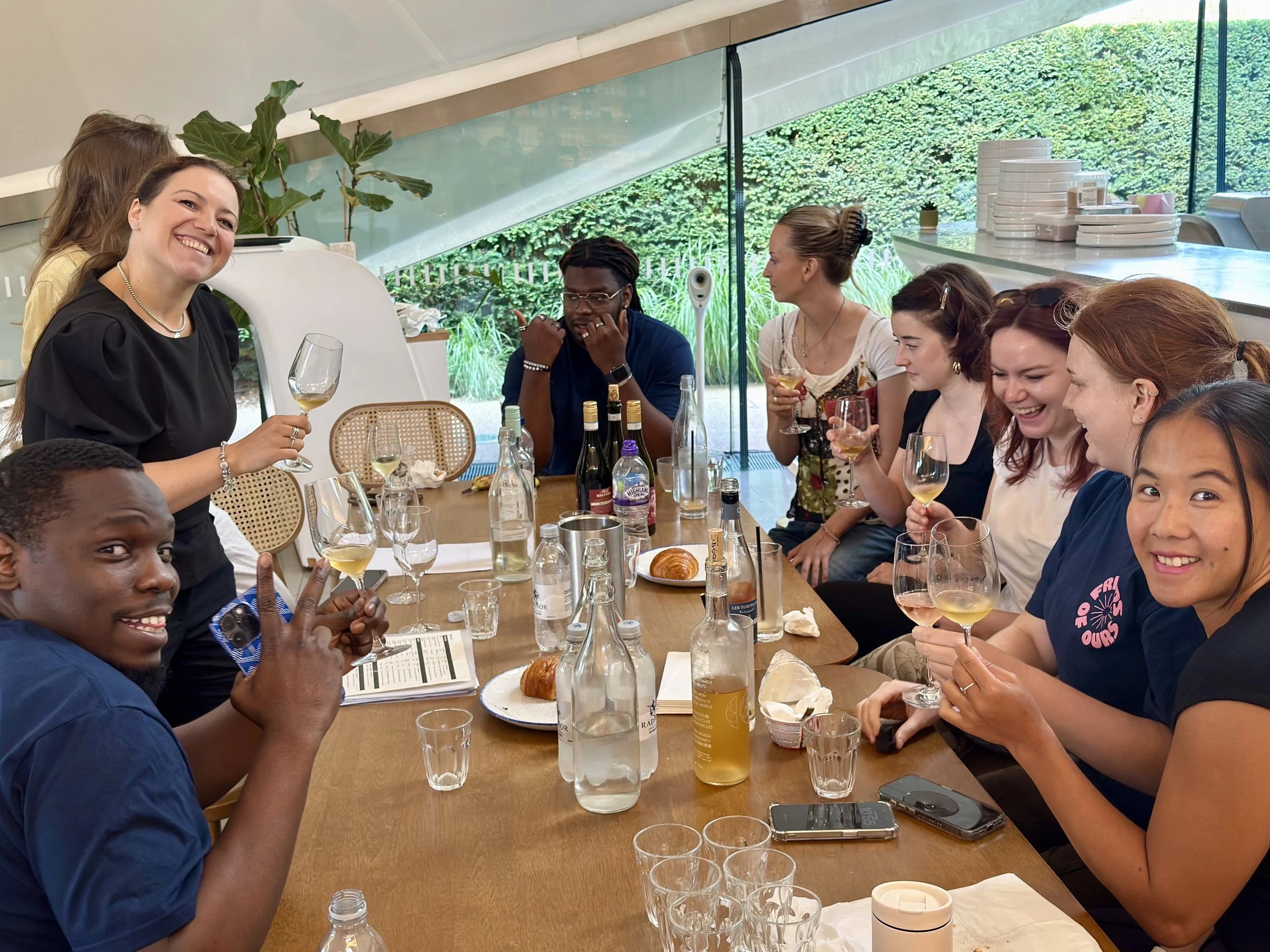 Martina and Amy  leading the tam in Wine Tasting