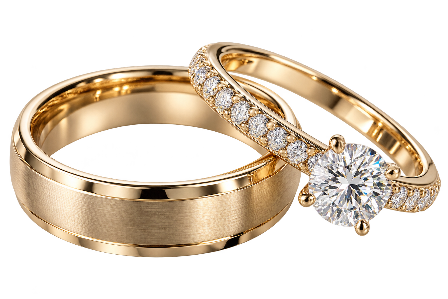 Two gold rings, one with a large central diamond and the other with smaller diamonds along the band, set against a neutral background.