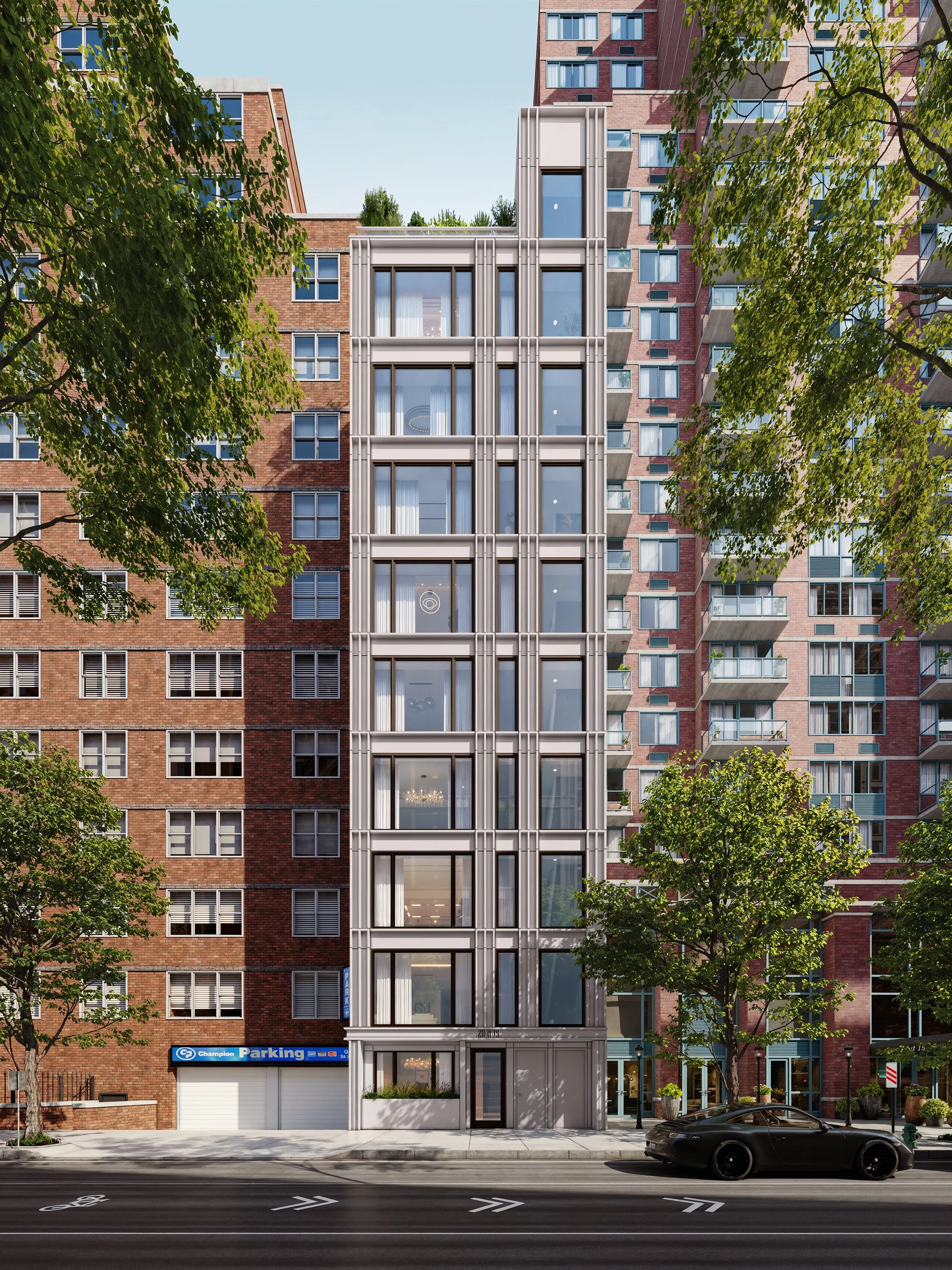 Modern multi-story building with large glass windows and decorative vertical metal panels, flanked by older brick apartment buildings, on a city street with trees and a black sports car parked in front.