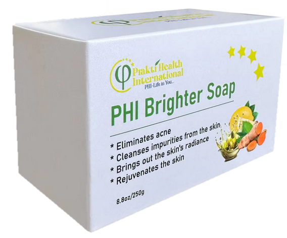 Boîte de savon PHI Brighter Soap avec des ingrédients naturels comme citron, carotte et citron vert, et des étoiles dorées.