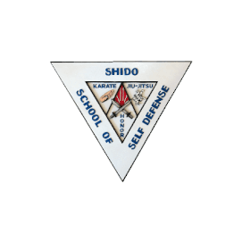 Triangular SHIDO School of Self Defense patch with a central emblem featuring a red and blue shield and karate, taekwondo, judo symbols, and the words 'Karate,' 'Taekwondo,' and 'Judo'.