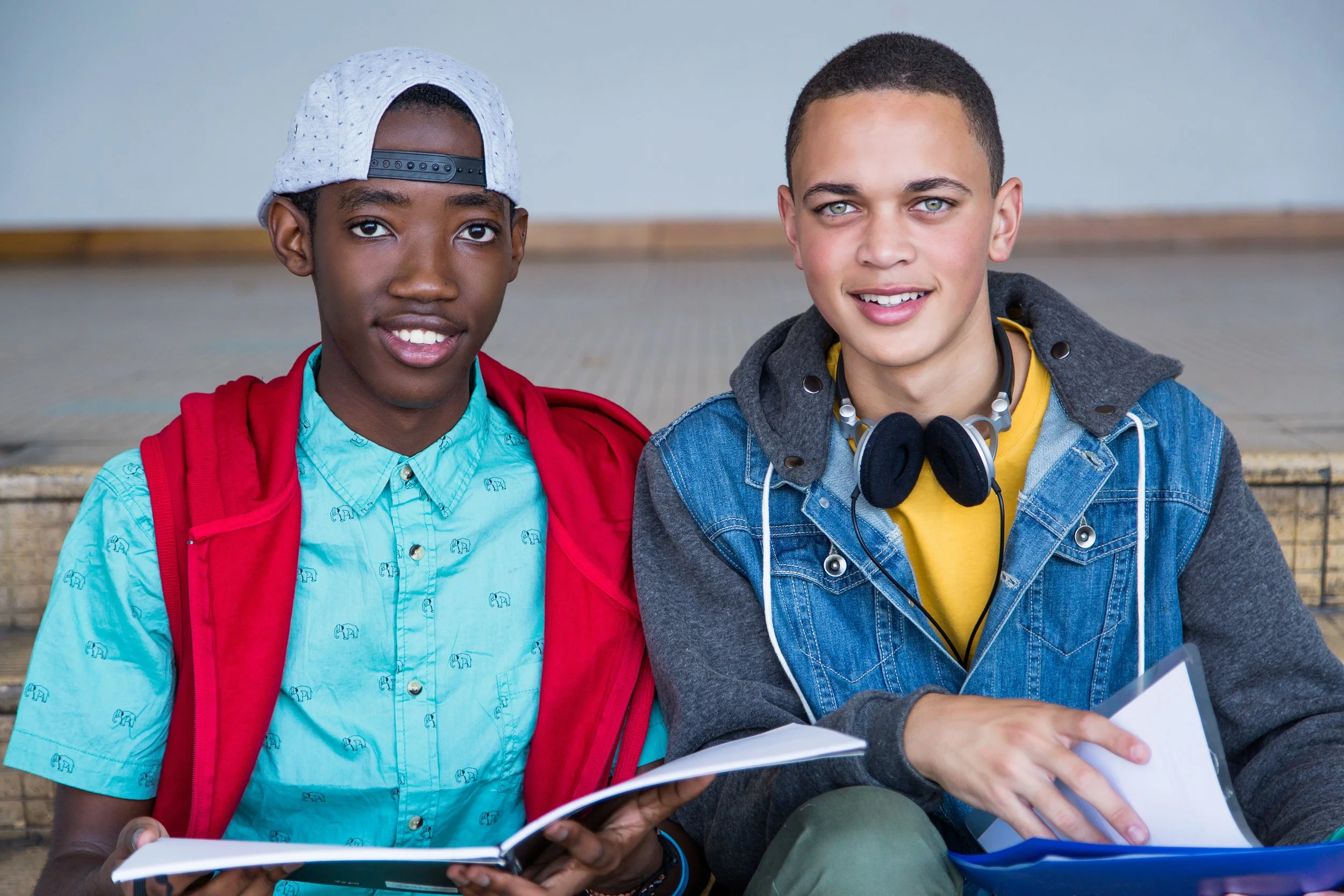 2 tween boys studying together.