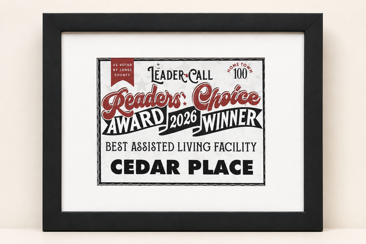 Framed award certificate stating it is the Readers' Choice 2026 Winner for Best Assisted Living Facility, Cedar Place, as voted by Jones County.