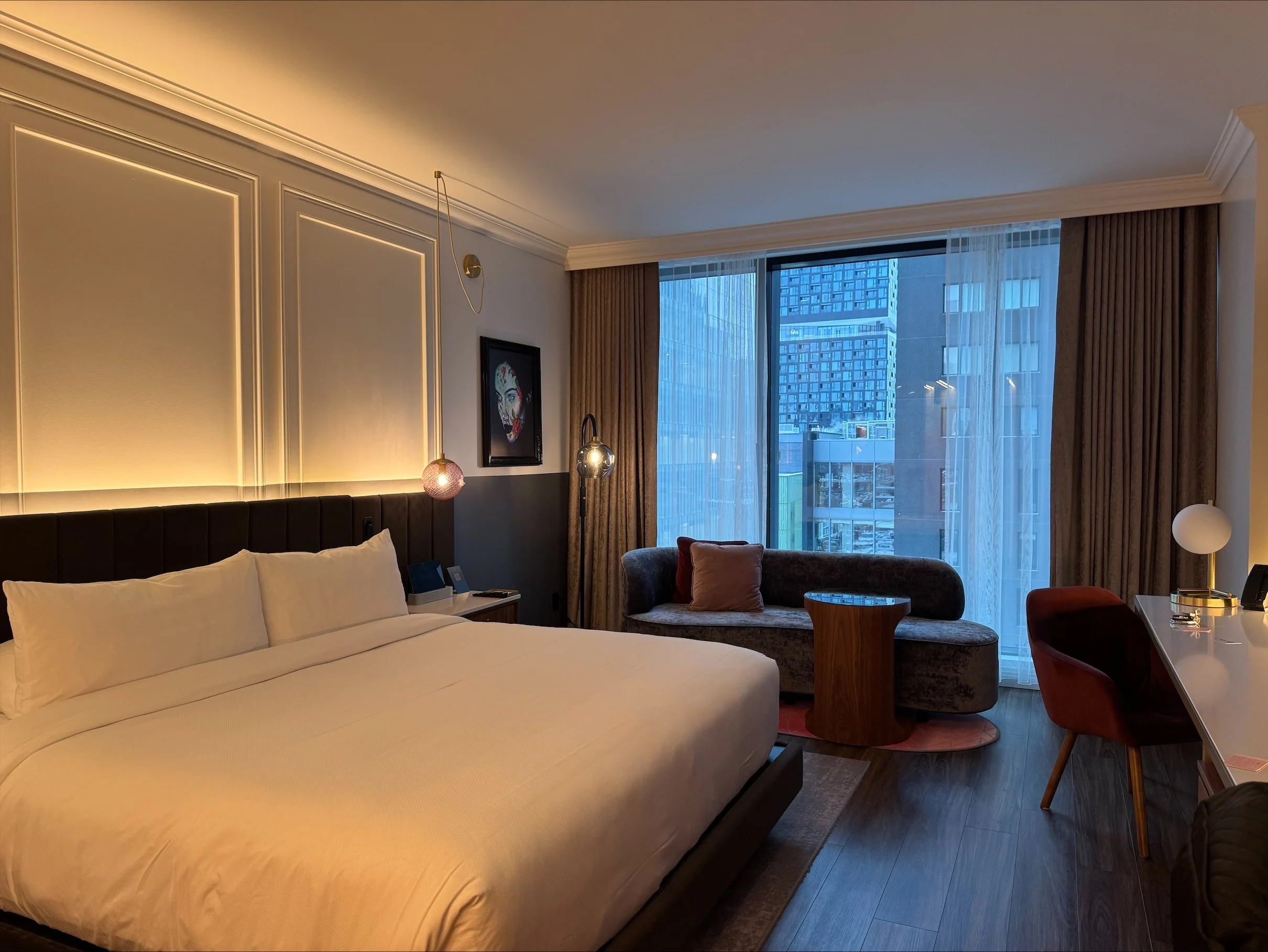 Wide-angle hospitality photography designed to showcase the room layout, style, and sense of space.