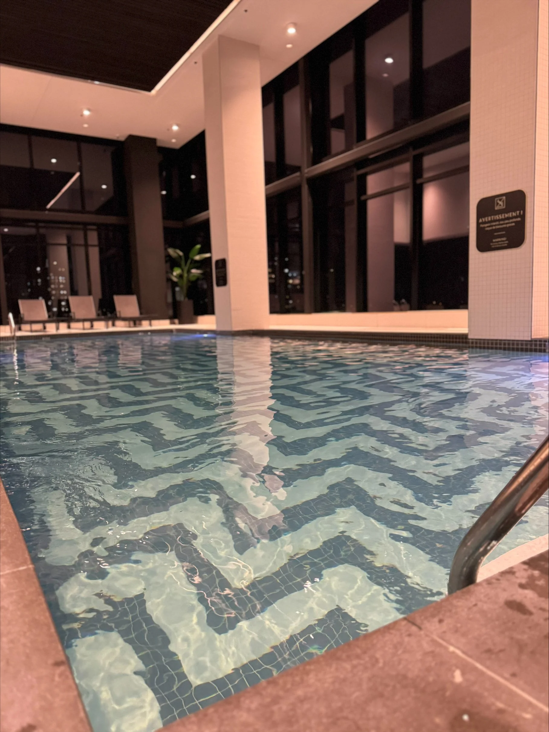 Lifestyle amenity photography showcasing the hotel’s pool and leisure experience.