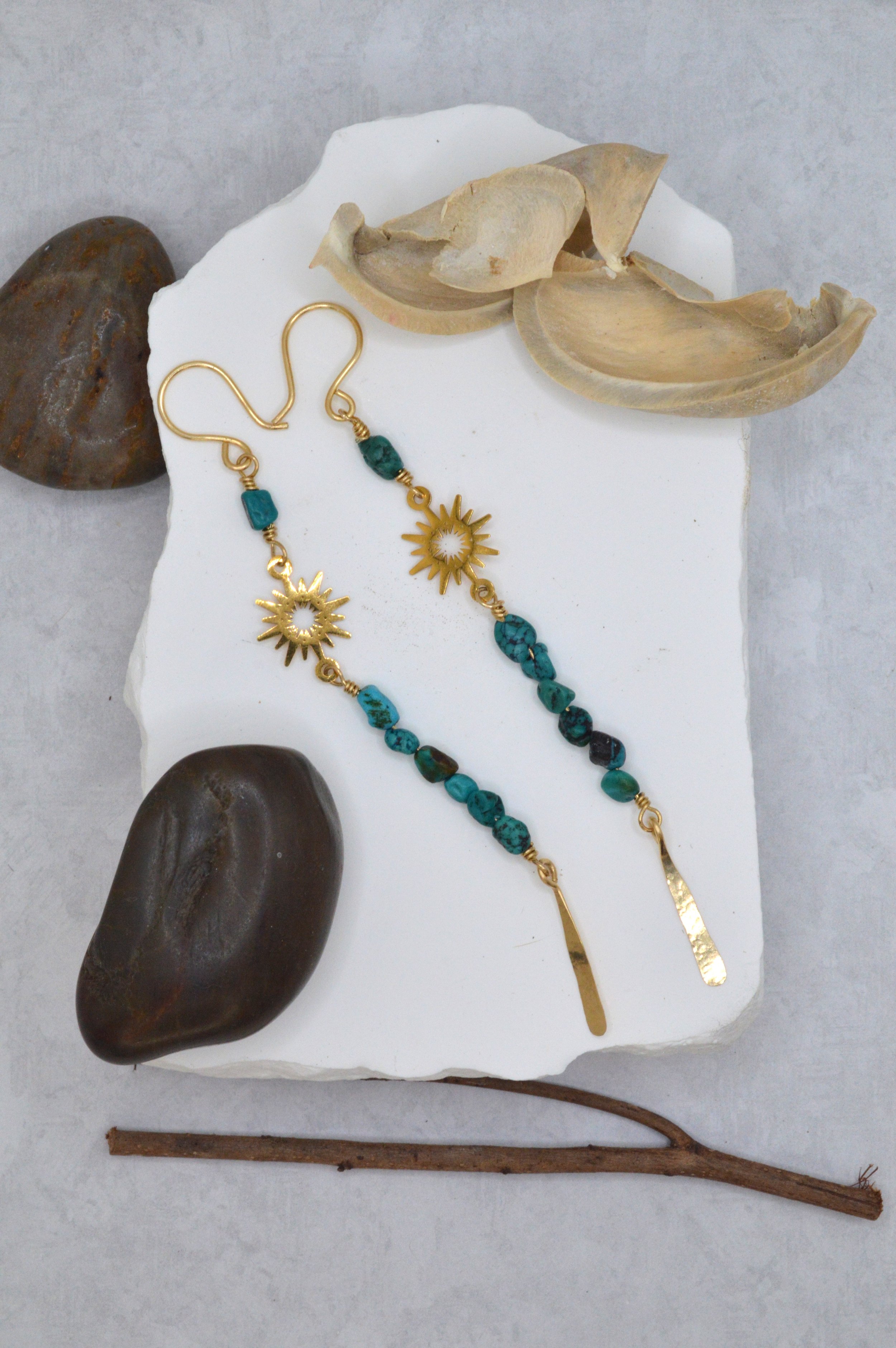 handmade turquoise nugget earrings with brass sunburst charm and hammered gold drop